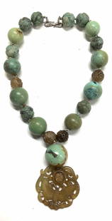 Natural Stone & Ceramic Asian Pendant Necklace: Handmade Luxury Chunky and heavy Bead necklace with carved stone. Verdigris ceramic beads ( 1.25 in./ 1+ in.) interspersed with carved natural stone ( green and black, green- brown Quartz). Carved Qua