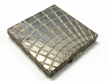 Vintage Sterling Silver Volupte Cosmetic Compact: Circa 1940s. Vintage cosmetic compact, marked Volupte, sterling on interior. Exterior is textured with resided designs. Interior has mirror on lid and latched blush compact. Approximately 3 x 3 inches