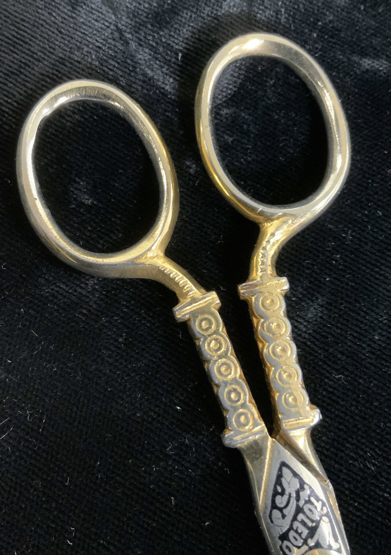 Toledo Gold Plated Embroidery Scissors, Spain: Damascene 3 Tres Claveles Gold Plated Embroidery Scissor by Toledo. Made in Spain. Spanish hand crafted Damascene scissors, in either 18K or 24k gold plate, customary in Spain. 5 1/8 in. Long. Some we