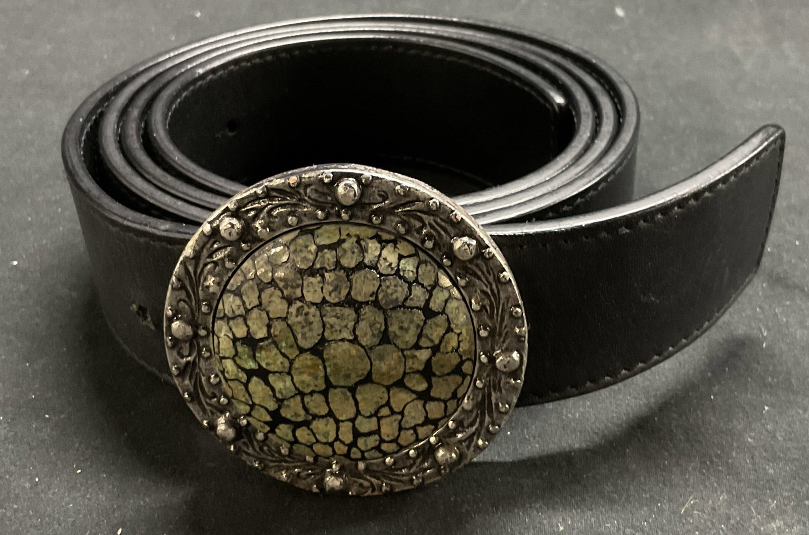 VALENTINO CARAVANI Black Leather Belt Italy: VALENTINO CARAVANI Black Leather Belt with gunmetal hardware and polished stone insert. Made in Italy. Size is 42/105.Peg in hole closure. Some surface wear consistent with age and use. Property of Ma