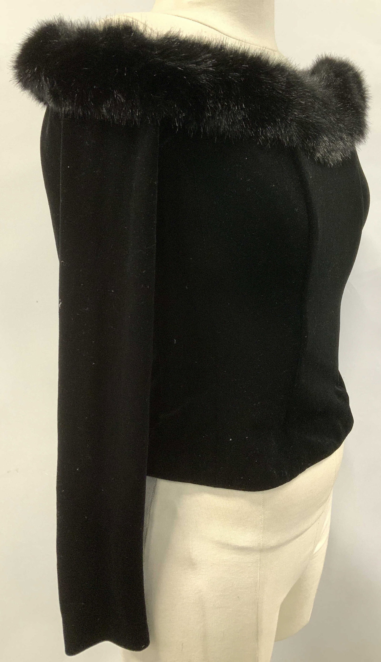 Dress Barn Faux Fur & Velvet Top: Size Small off the shoulder top with faux fur collar and all black velvet. Structured corset wire, backside zipper that zips upward. Long sleeve, fully lined. 15.5 in. Long. Evening wear, ladies tops,
