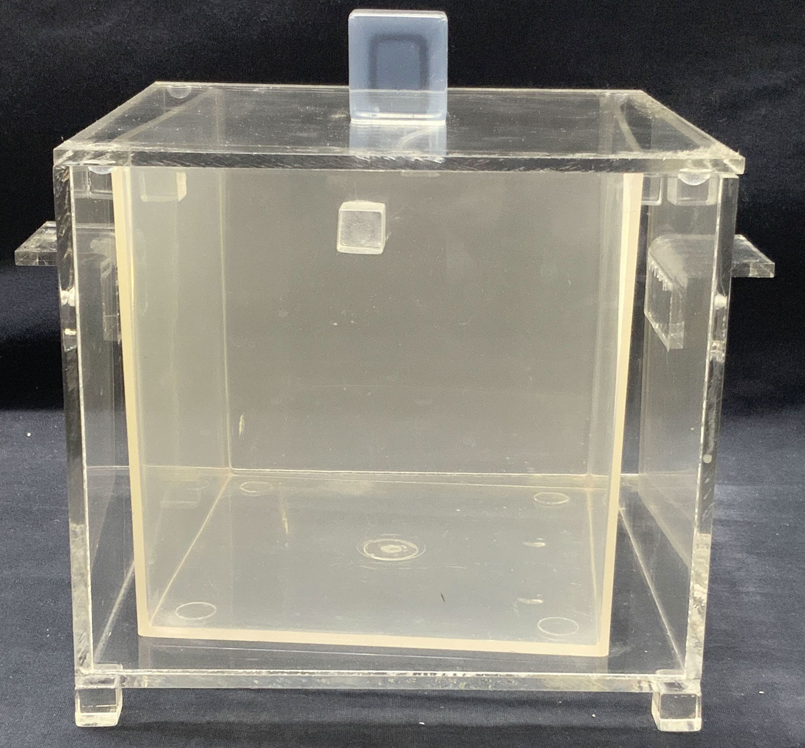 Art Deco Lucite Ice Bucket: Art decor square shaped ice bucket with side handles and removable insert. All see through. Approx 9 inches tall and 7.5 x 7,5 inches wide. Evident wearing and residue one exterior to ice bucket. Luci