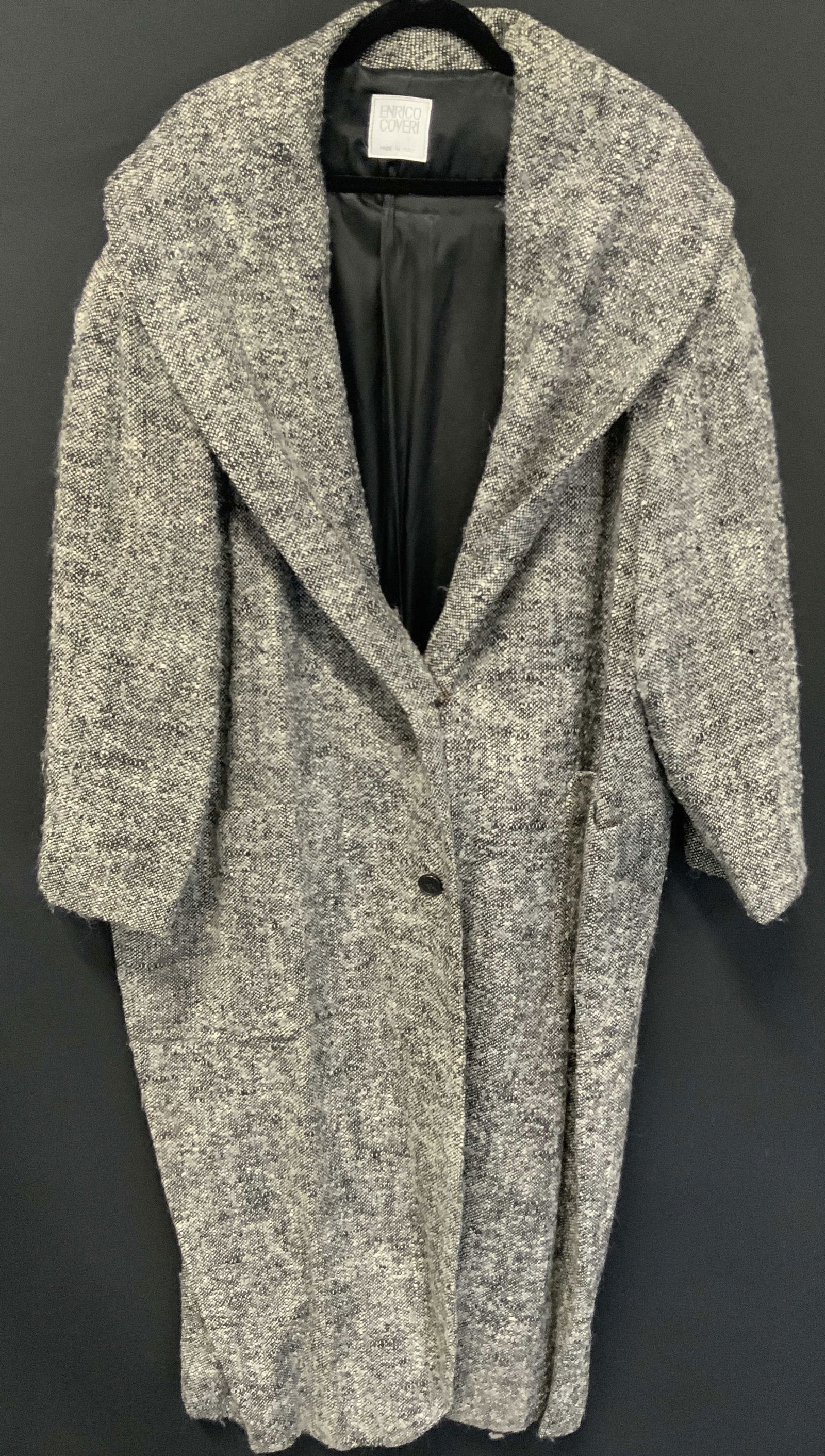 ENRICO COVERI Vintage Italian Coat: A vintage ENRICO COVERI Italian coat. White, gray, and black to exterior. Two pockets and two button to exterior. Interior lined with soft hand black material. Measured hanging, measures approx 56 inc