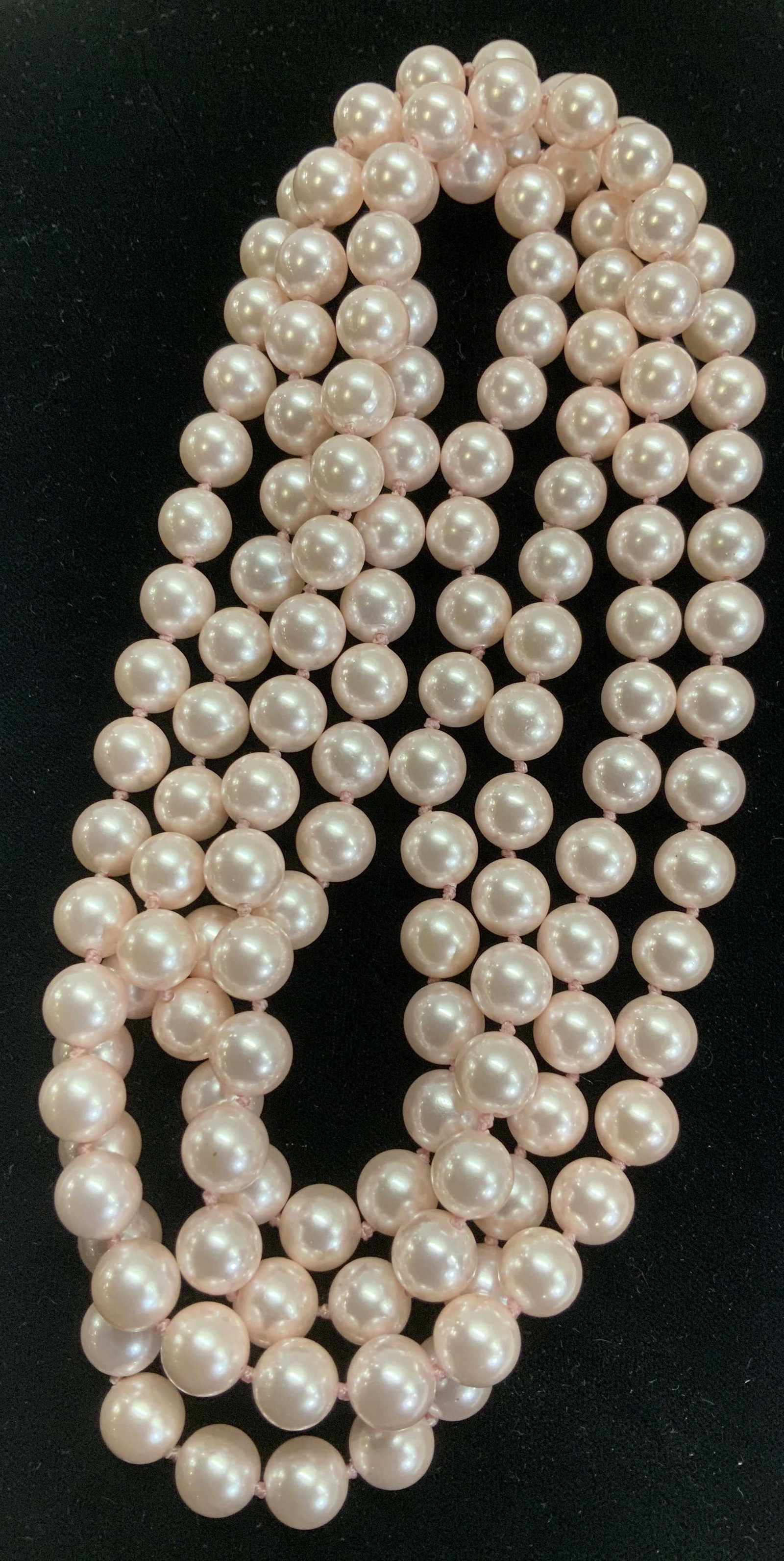 Rope Length Pink Glass Pearl Style Necklace: 25 in. Drop necklace of luminous pink glass pearl beads, double knotted. These have weight. Luxury Statement jewelry, Luxury Chunky Jewelry, Luxury Estate Jewelry, luxury vintage jewelry, Ladies Luxur