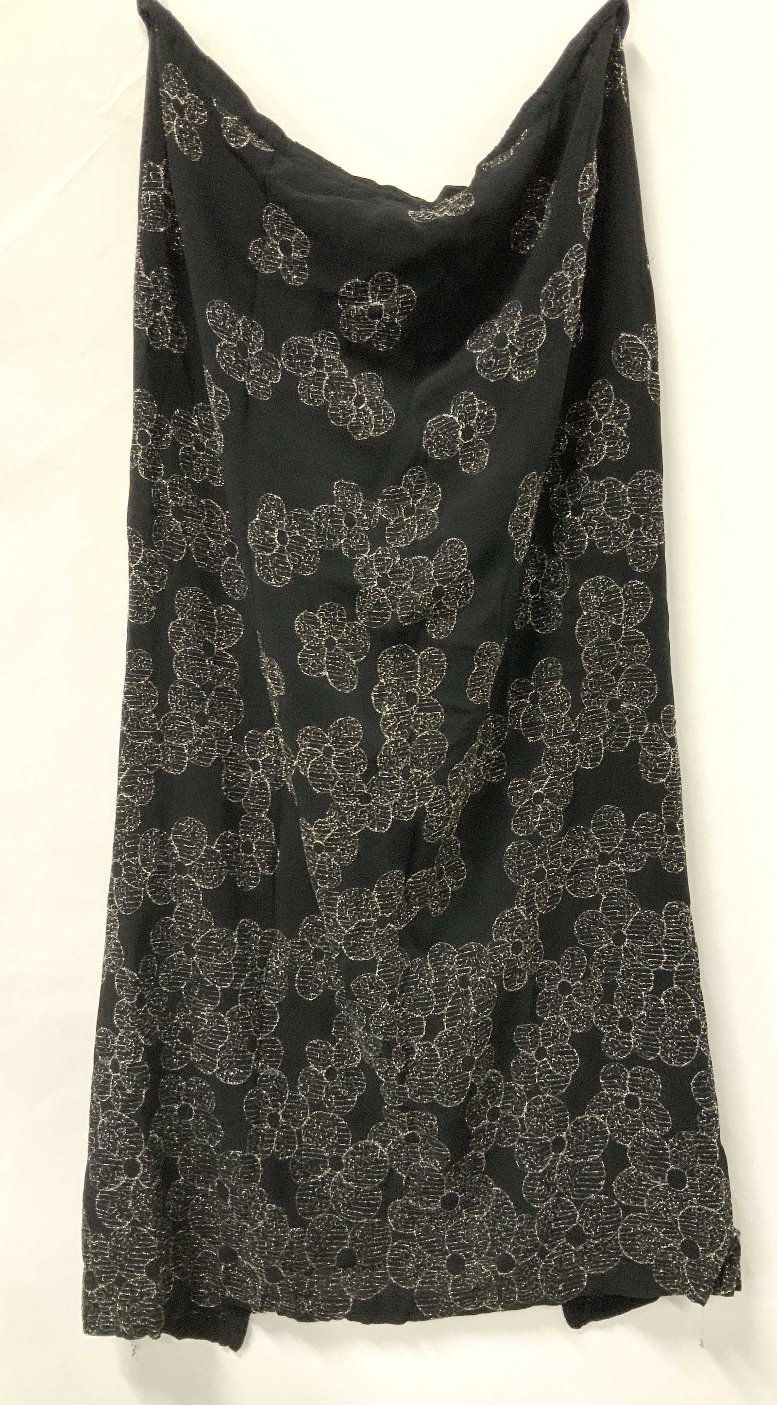 GHOST Designer Skirt w Metallic Flowers, England: Vintage black rayon skirt with metallic silver flower pattern. Size Medium.. semi sheer fabric , designer Ghost. Made in England. Stretch waist and needs to be replaced or wear with a belt to keep fro