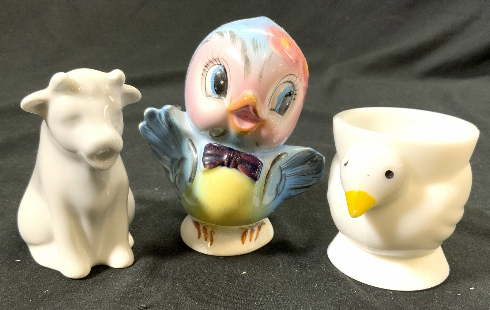3 Tabletop Decor, Dansk, Opalex France, Lefton: Lot includes 1 Porcelain cow creamer DANSK on underside, 1 glass duck vessel underside reads OPALEX MADE IN FRANCE, & 1 porcelain bird salt shaker marked LEFTON. Salt shaker measures approximately 3.5