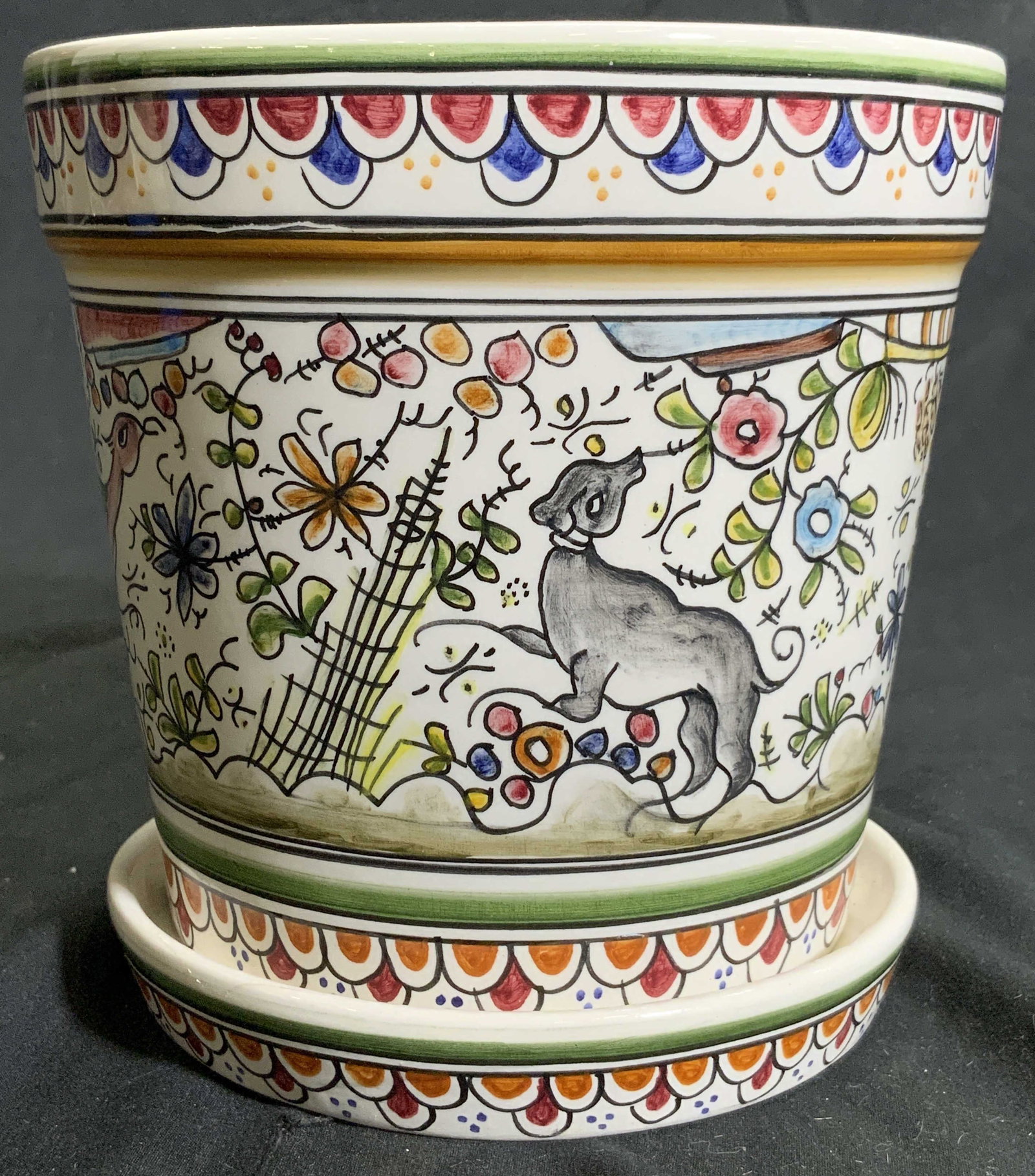 Signed H Painted Porc Planter & Dish PORTUGAL: Underside reads 23 ARTE CERAMICA ARLER COIMBRA PORTUGAL SELXVII HAND PAINTED LENA. Lot includes planter and matching drainage dish. Pieces is hand painted with floral, leaf, geometric & animal detail.