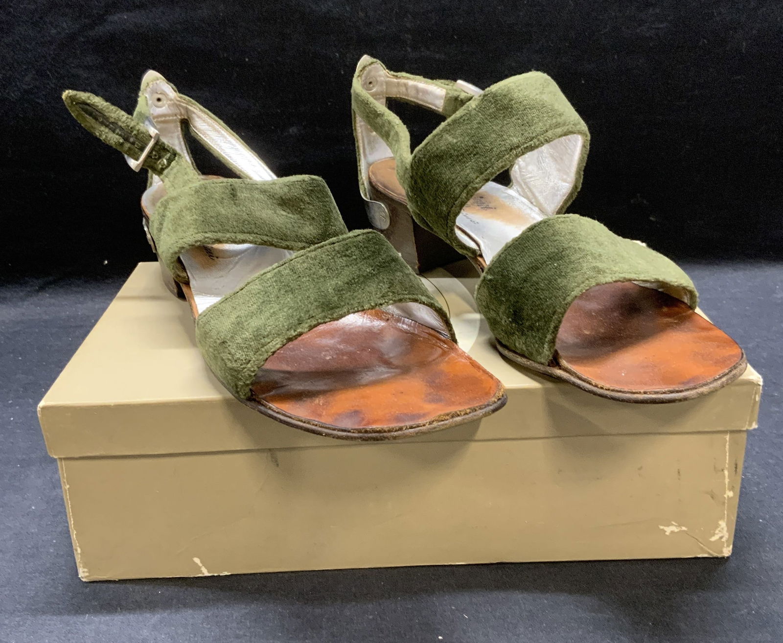 Ruccioni Green Velvet Sandals, Italy: Ruccioni green velvet sandals. Measure approx. 9.5 inches long. Heel height approx. 1.5 inches. Made in Italy. Wear to insole, outsole and material consistent with exposure. Includes shoe box. Propert