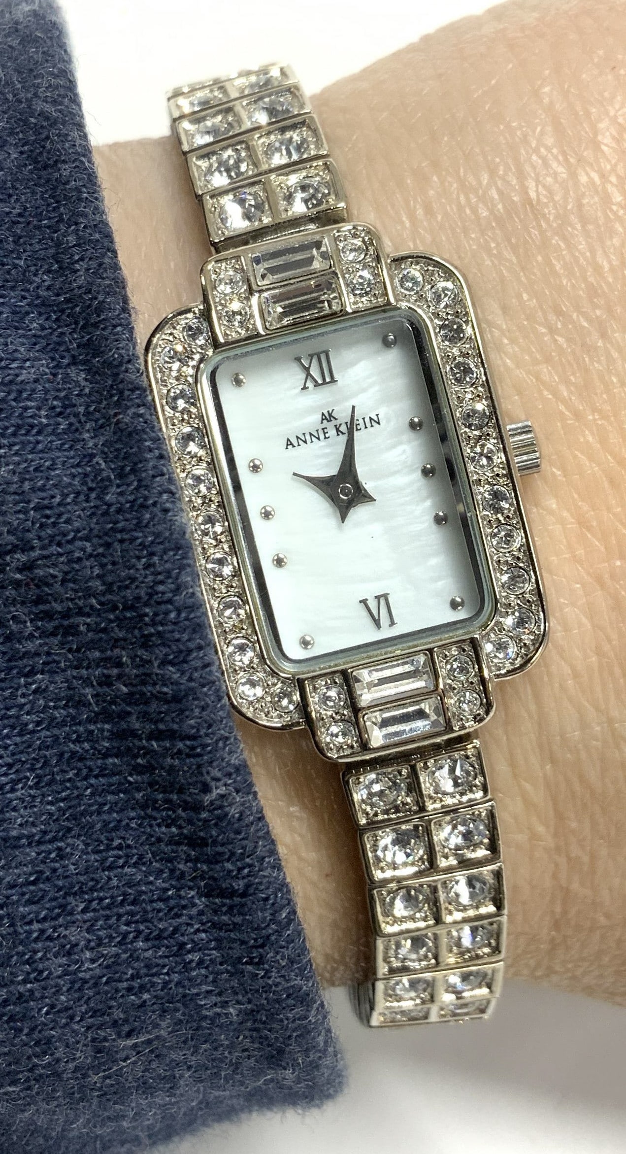 Anne Klein Crystal Wristwatch, Ladies Jewelry: Anne Klein Wristwatch in silver tone with double row crystal band, box clasp. Has an extender. 6.5 in. or 7.25 in. Long. Watch, crystal wristwatch, Anne Klein Crystal Wristwatch, statement Jewelry, vi