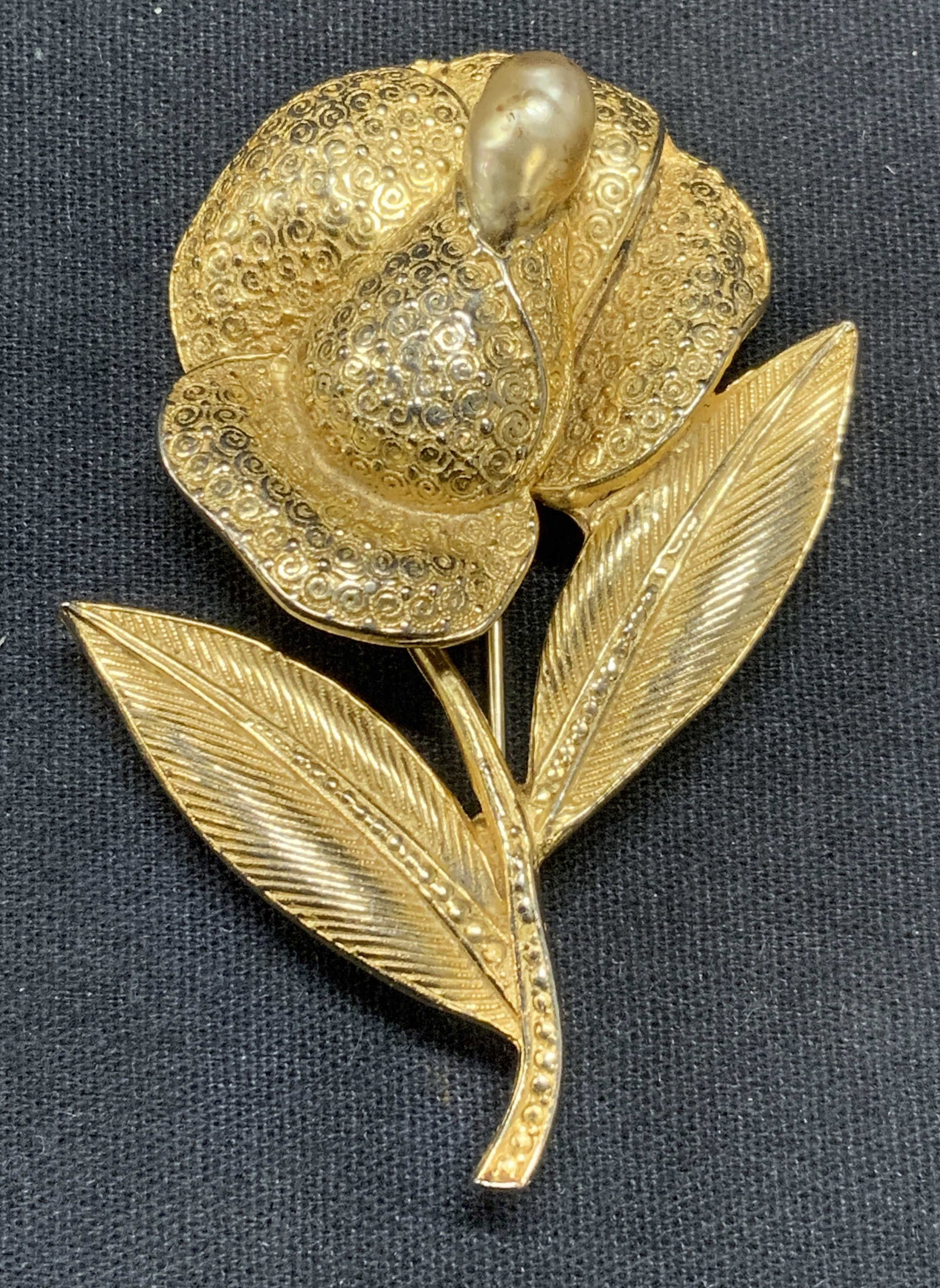 Vintage HOBE Gold Tn Faux Pearl Flower Brooch: Vintage Hobe gold tone textural brooch with faux baroque pearl decoration. Signed to underside. Hinge pin to underside. Measures approx. 2 5/8 x 1.75 inches. Some scratching observed. Estate jewelry, 
