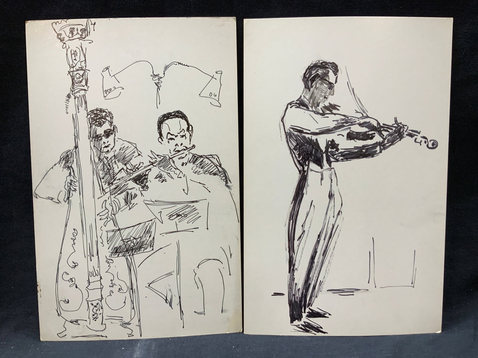 Merker Signed 2 Orchestra Player Ink Sketches: Lot of 2 sketches. 1 signed on backside Merker. 1 depicts two men, a flute player and cello player with sheet music in front of them and the other depicts a violinist standing. No frames. Approx 14 x 