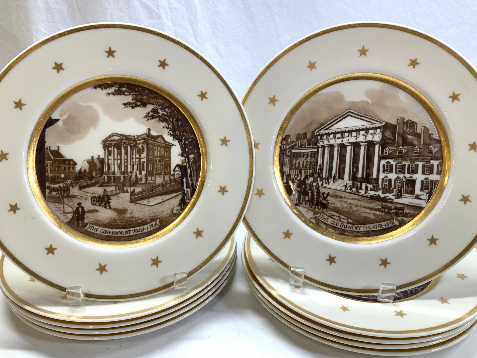 Set10 Lenox Patchin Old New York Lm Edition Plates: Limited edition plates by Lenox England , painted by Minga P Patchin 1933. Depicts locations in colonial New York based on antique drawings. Each location / scene labeled and dated. Cream colored porc