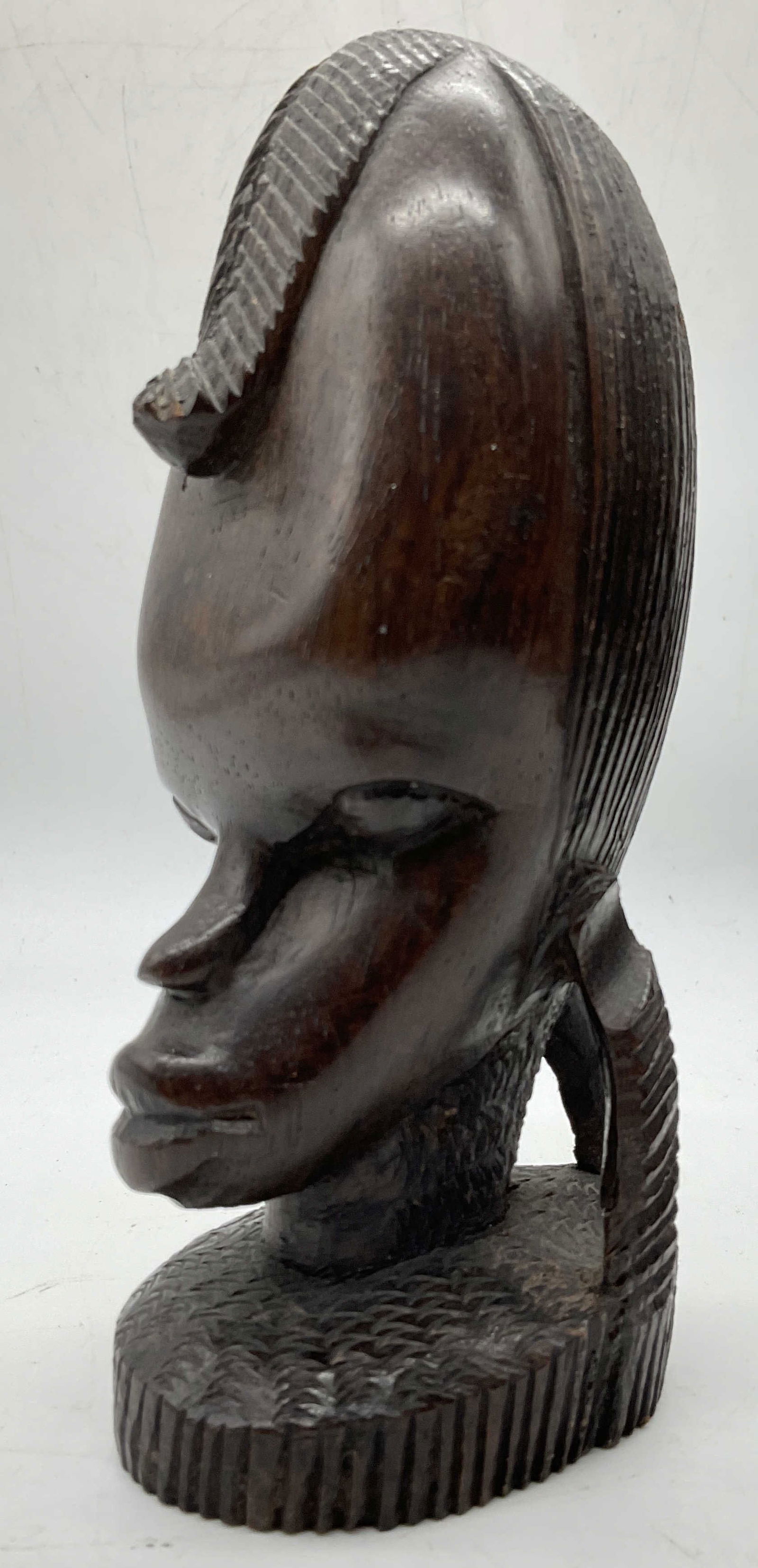 Hand Carved Ebony African Head: Hand Carved Ebony African Head. Measures approx 6H x 3W in. Property of Greenwich Connecticut estate. Owners had relocated from their life in Vienna , Austria, bringing a fine collection of period Eur