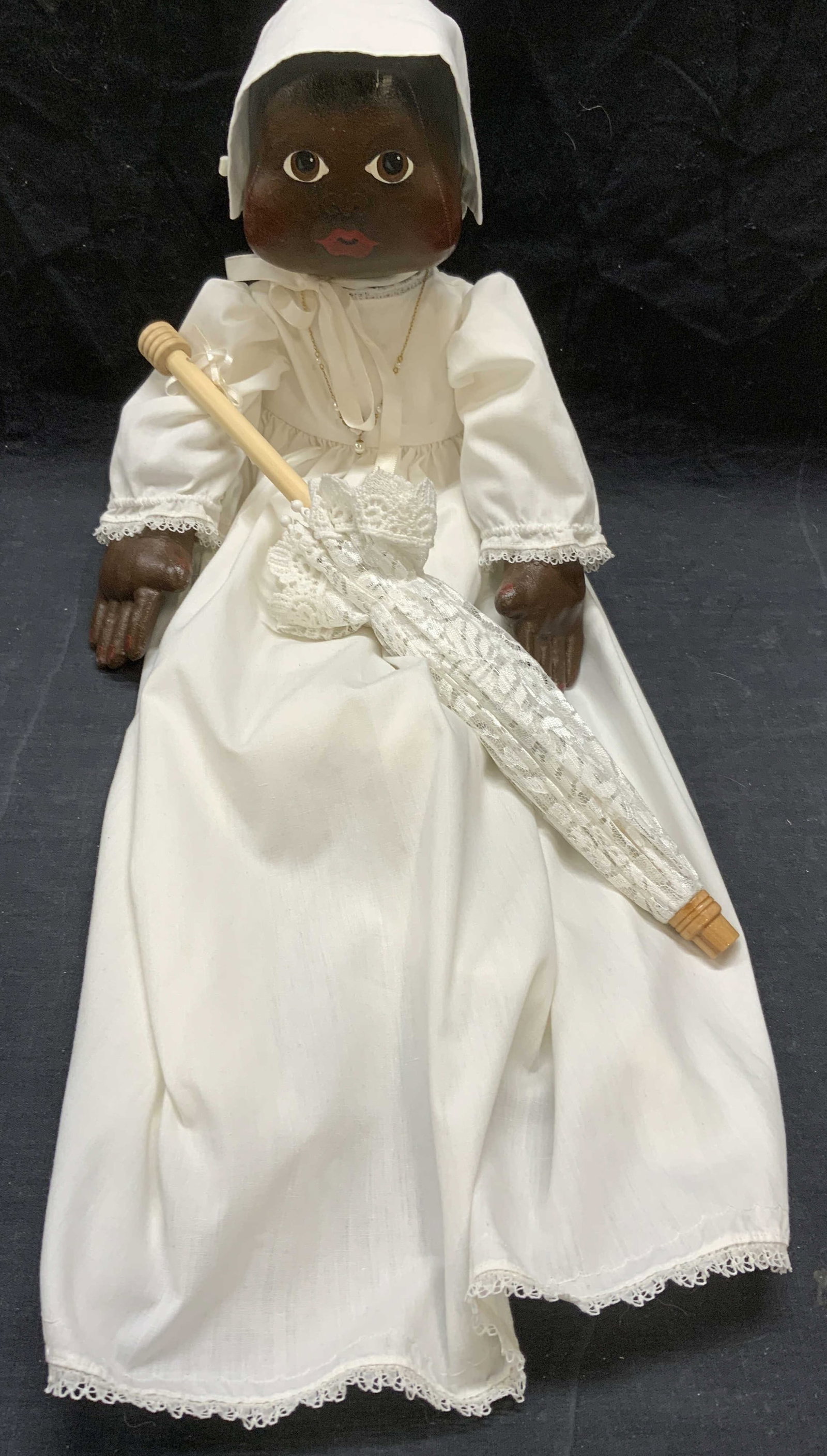 Hand Painted Fabric Baby Doll, Christening Outfit: Hand painted fabric baby doll with christening dress and bonnet and parasol. Doll measures approx. 19 inches long. Some surface wear to doll consistent with exposure. Fabric doll, hand painted doll, f