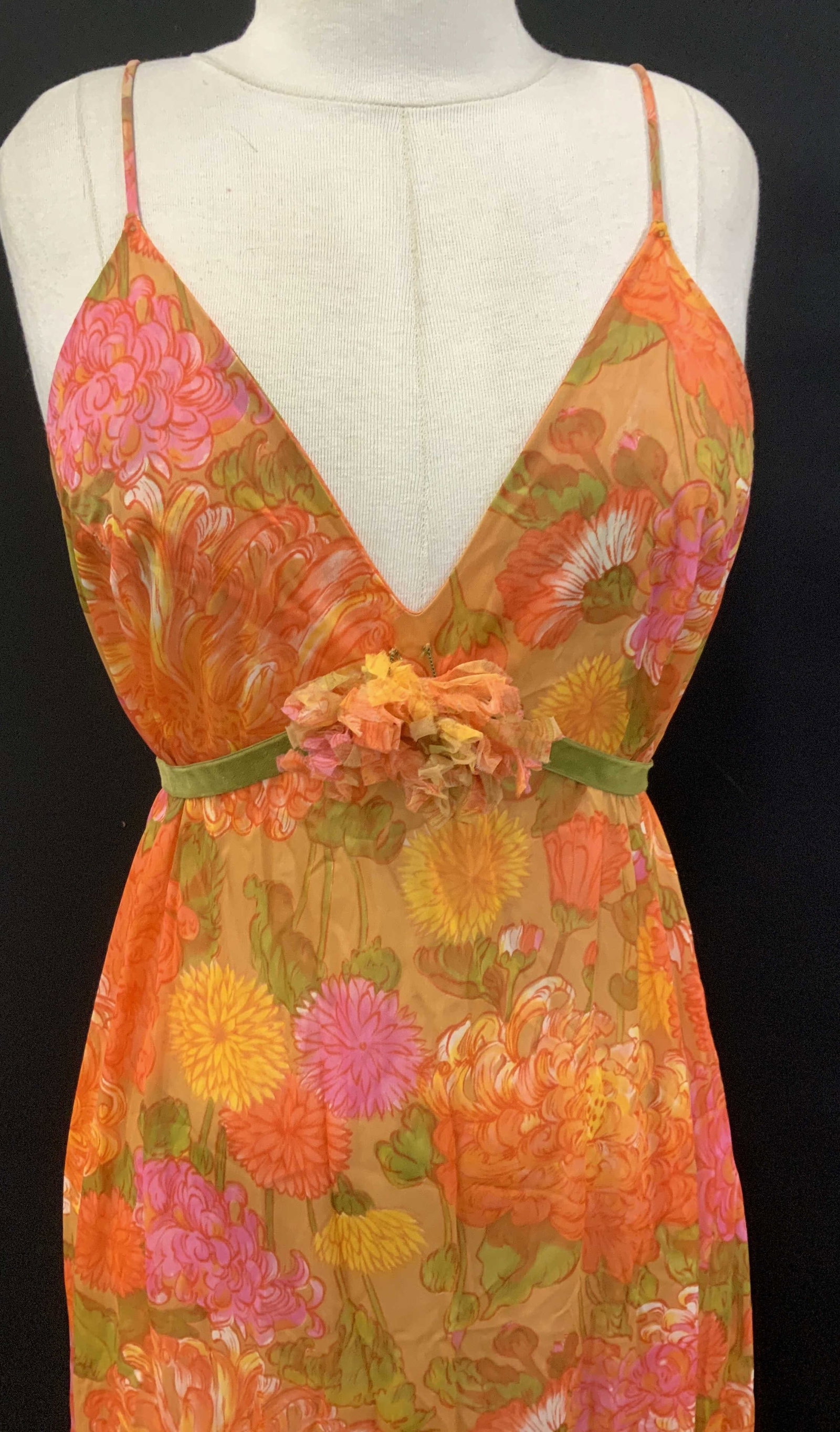 Vanity Fair Vintage Floral Nightgown Neglige, USA: Vanity Fair Long Orange floral nightgown/ neglige with a velvet tie ribbon that has a matching fabric attached ruched flower. Size 38. Ankle length 54.5 in. Accents of pink, yellow, and green. All nyl