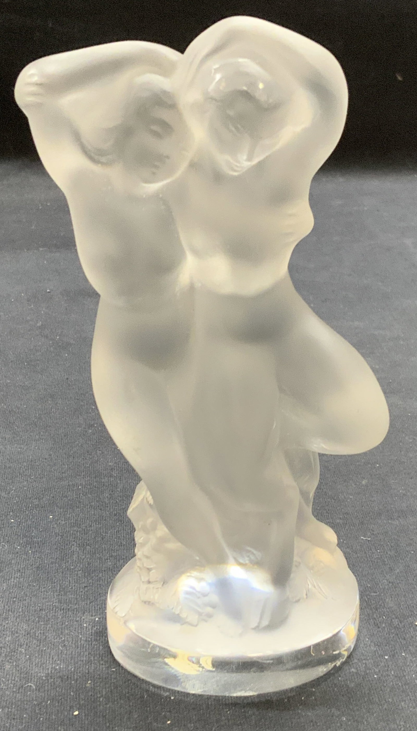Lalique France Crystal Woman & Faun Figural: Lalique crystal nude female figure with faun / Pan and Diana, Signed along base. Measures approx. 2.5 x 2 x 5.25 inches. Som scratching observed. Lalique, Lalique France, Lalique figurine, collectible