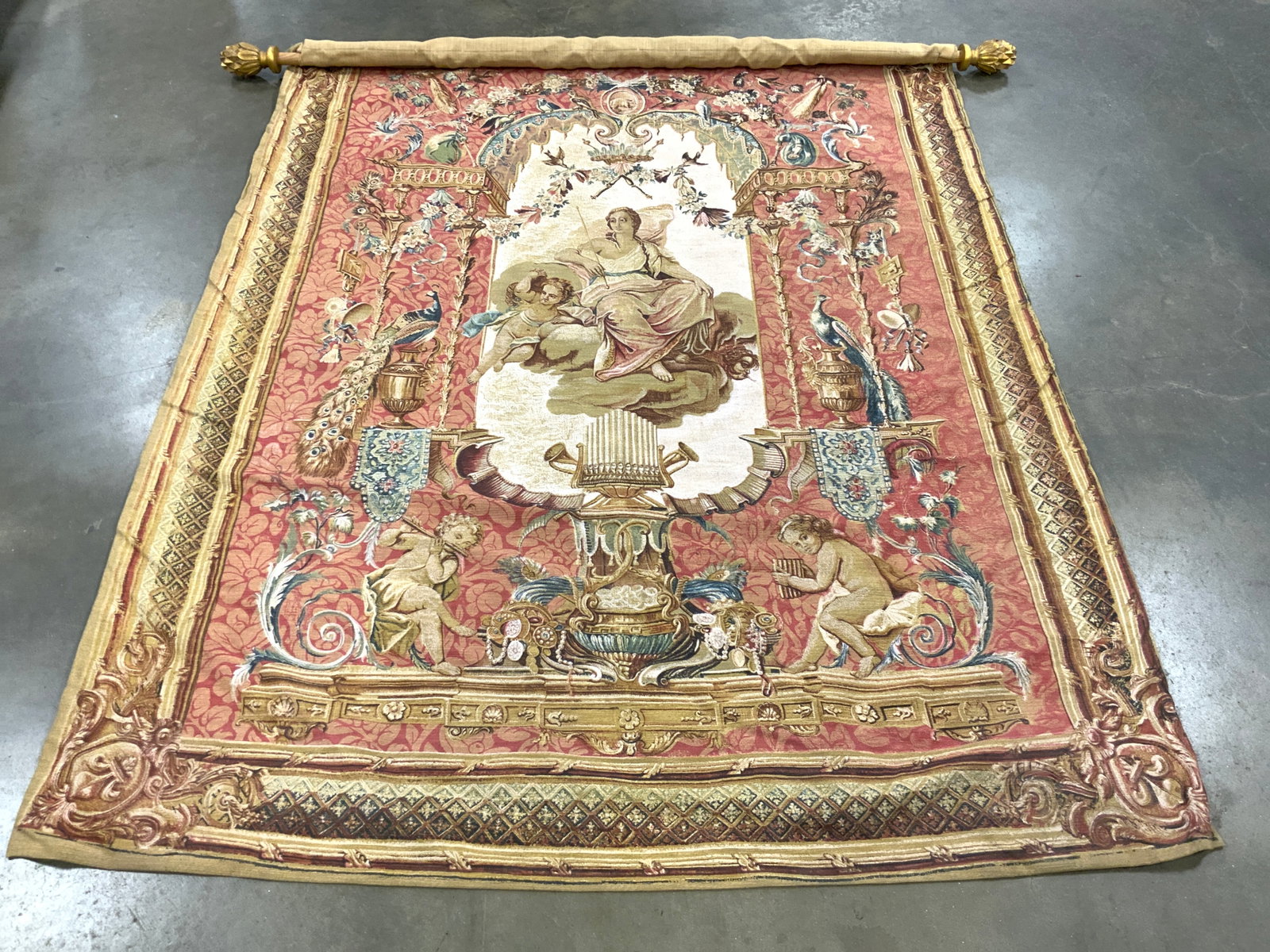 Vntg French Style Tapestry after Portique de Junon: French style tapestry after Le Portique de Junon (The Portico of Juno). printed color scene with female deity at center of cartouche with curtained swags and floral garlands throughout , peacocks on f