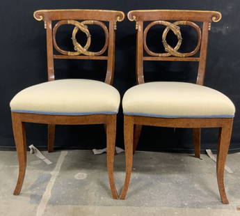 Pair NIERMANN WEEKS Carved Snake Figure Chairs: A pair of vintage hand carved neoclassical style snake figural NIERMANN WEEKS chairs. The snakes to the chair backings are consuming one another, ouroboros style. Gilt accents throughout the carved wo