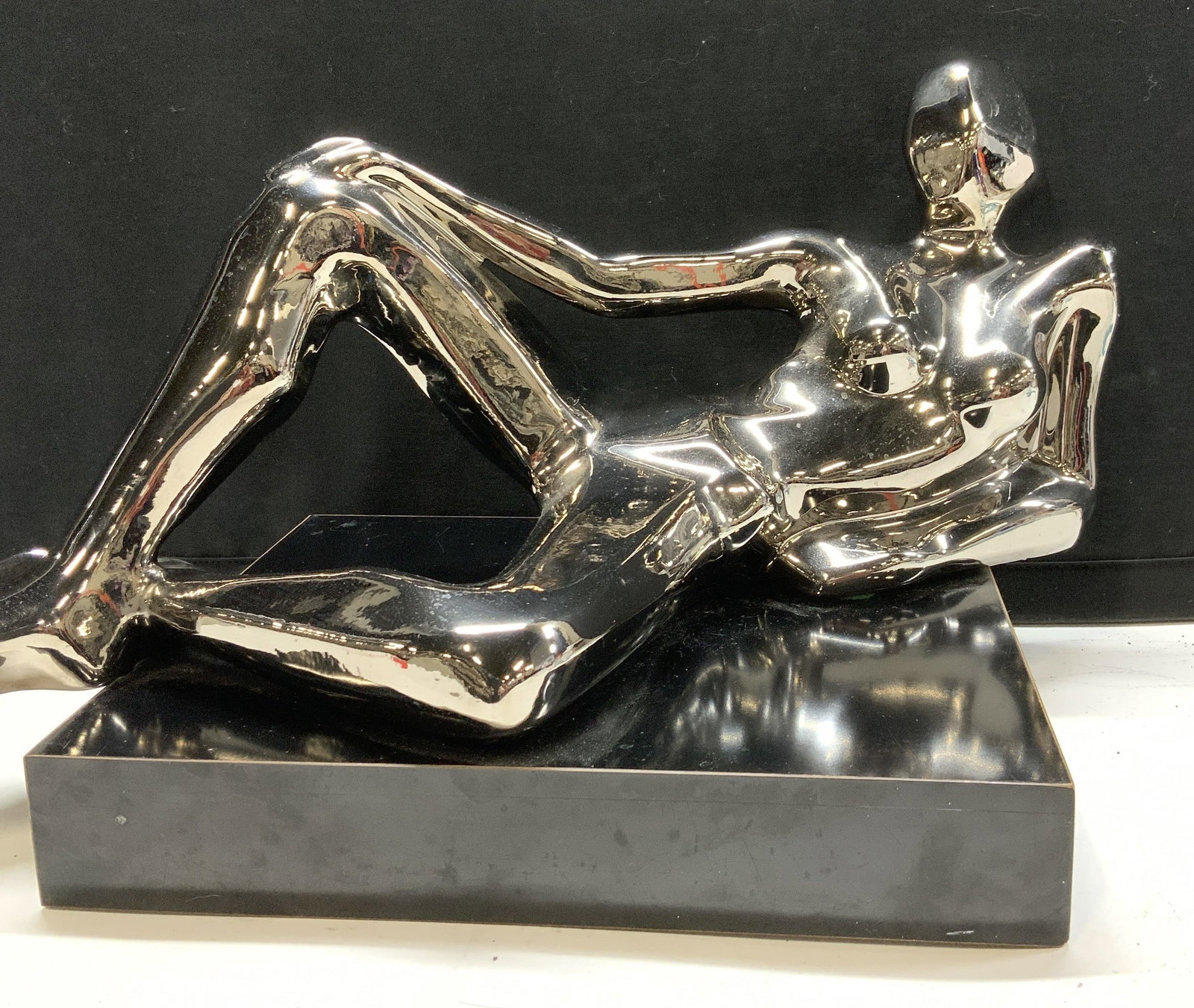 Jaru Silver Ceramic Art Deco Nude Sculpture 1ft5in: Modern Cubist Silver tone Nude Ceramic Sculpture, in the style of Hajime Sorayama. Mid century Modern, c. 1970s. Nude woman with spread legs , sits on a black laminate base. No marks. Measures 17 in. 