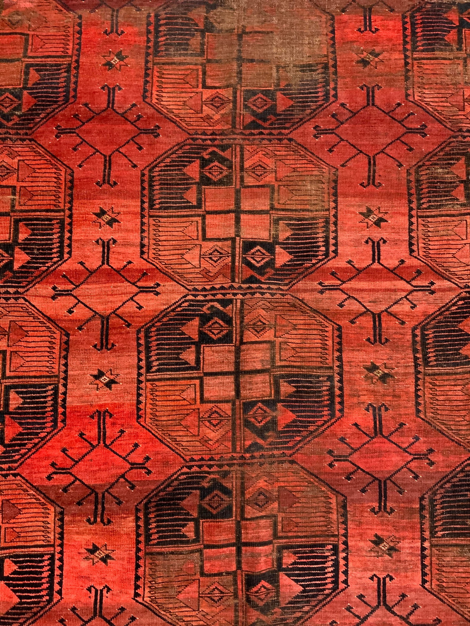 Antique Handmade Afgan Wool Area Rug: Rug is handmade and wool. Piece appears to be antique possibly vintage. Rug has multi toned geometric detail. Edges have fringes. Piece measures approximately 111 inches long 88 inches wide. Rug, carp