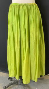 Romeo Gigli Green Silk Pleated Skirt: Lime green pleated skill skirt with a tie dye style of added yellow in the fabric. Labeled Romeo Gigli. Stretch waist, pleat style., waist 38 in. Length 32.75 in. Long. Rip along stretch band. A few h