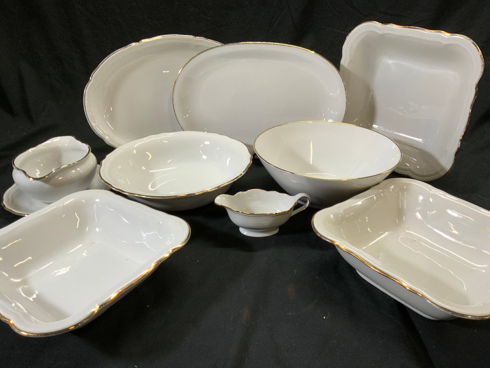 Seltmann WEIDEN-E White & Gilt Chinaware, 9: Seltmann WEIDEN-E Vintage Bavarian Germany China pieces. All white with gilt rims. Hallmarked on underside. Wear to gilt. Consisted of server ware china. 2 platters, one with a straight edge, the othe