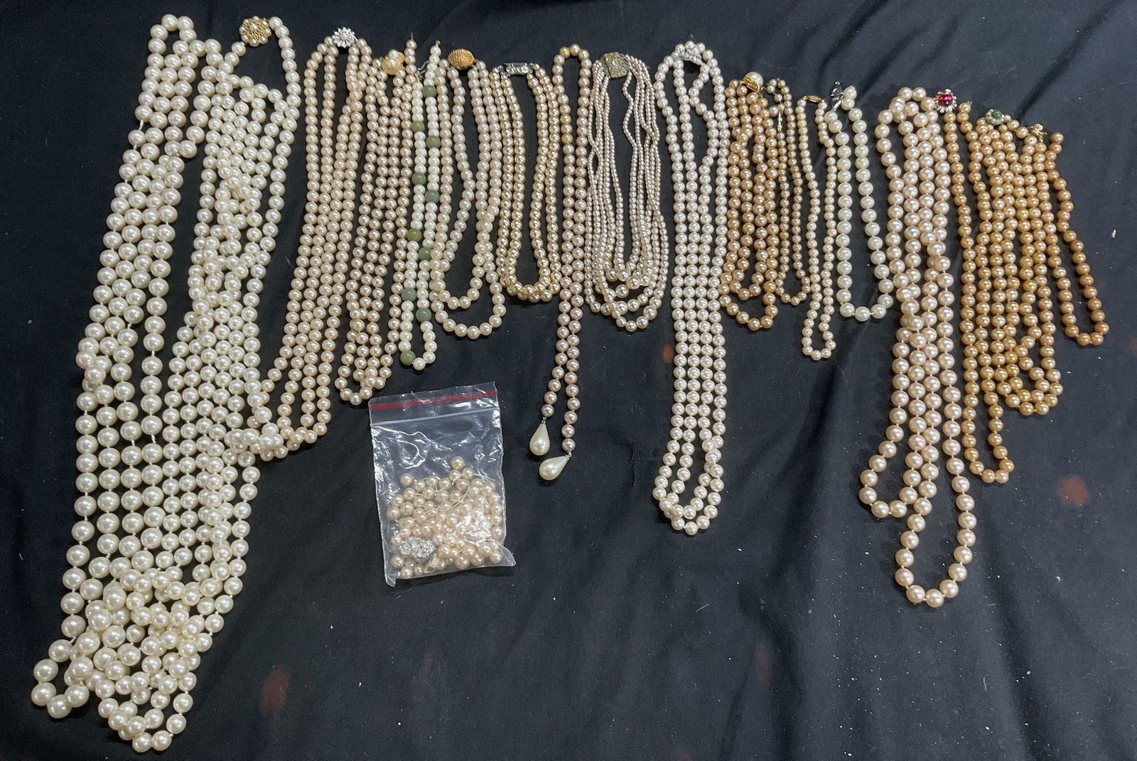 Grp 17 Sterling Silver Faux Pearl Necklaces.: Group Lot 17 String Faux Pearl Necklaces. Some broken. Choker length, lariat style, multi-strand necklaces. Sterling Silver and 14K gold clasps. Lariat style measures approx. 26 L in. Chunky jewelry,