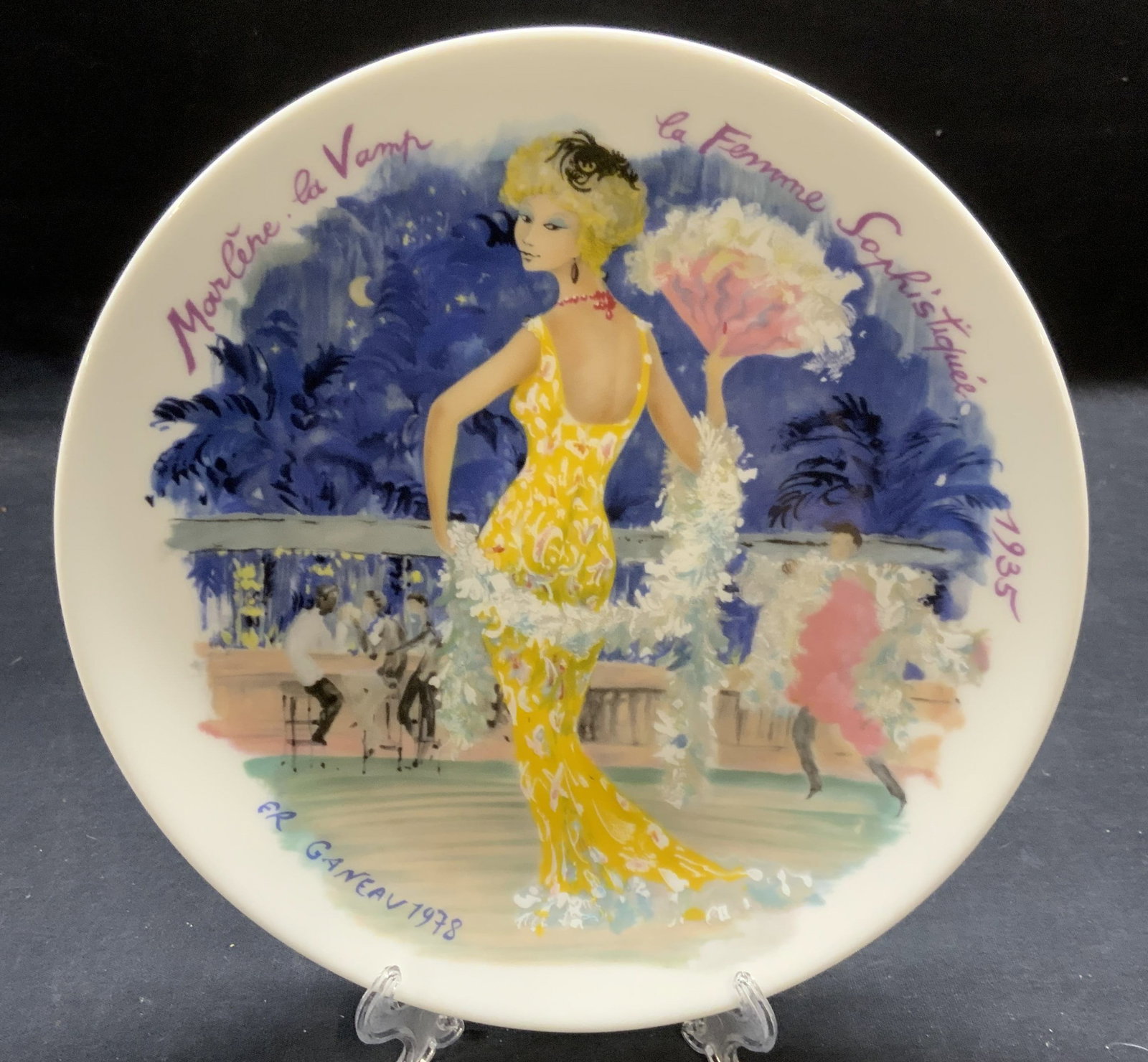 Lm Ed D ARCEAU Limoges Porcelain Femmes Plate 1978: Limited edition DARCEAU Limoges porcelain plate. Les Femmes Du Siecle 1935 series. Issued 1978. Marlene, The Vamp, The Sophisticated Woman. Hand painted decoration featuring fashionably dressed woman.