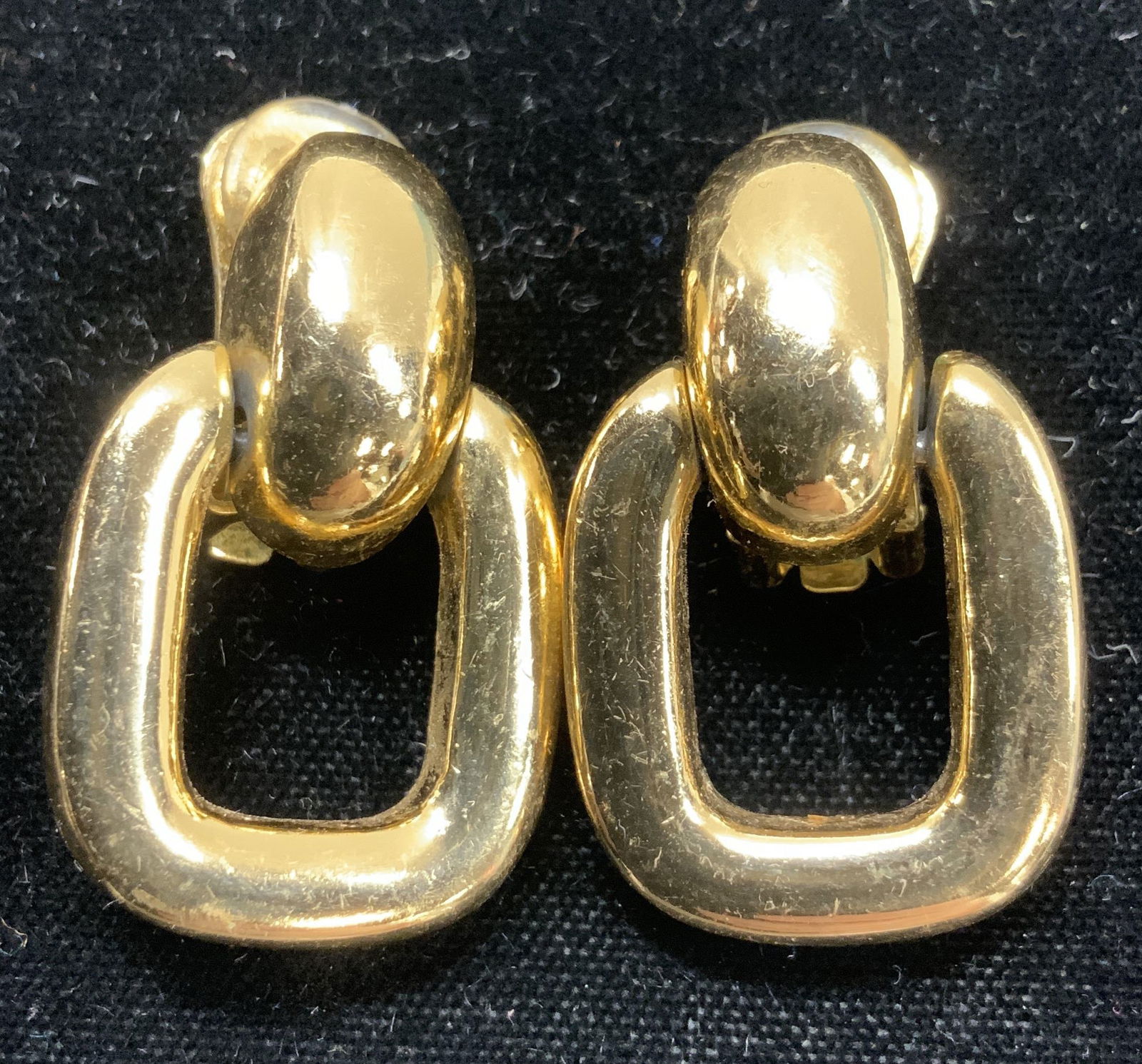 BURBERRYS SGN Gold Tone Clip On Earrings: BURBERRYS signed gold tone drop clip on earrings. 1.5 x 3/4 in. W. Some surface wear consistent with use and exposure. Luxury Statement jewelry, Luxury Chunky Jewelry, Luxury Estate Jewelry, luxury vi