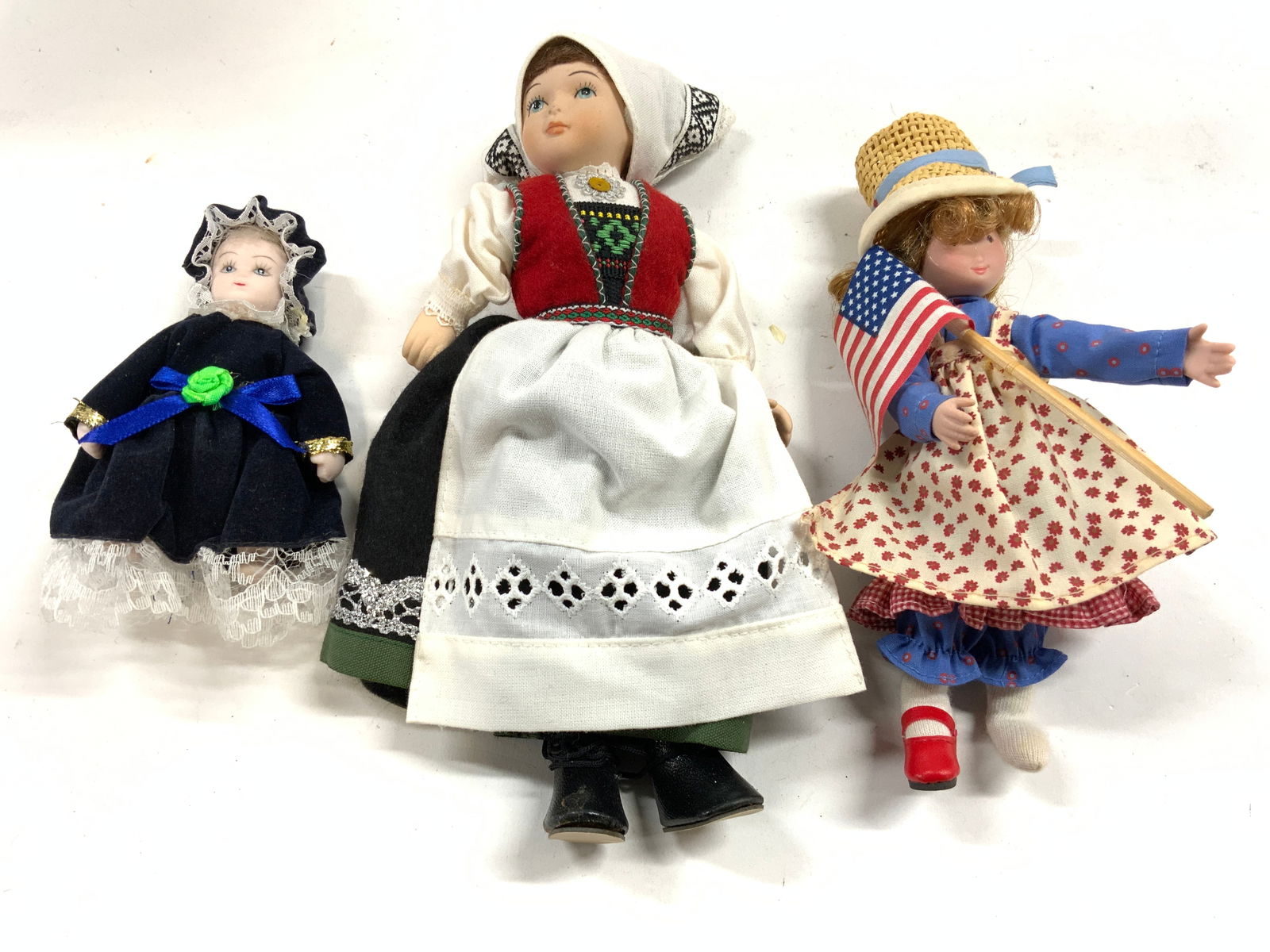 Lot 3 Vntg Bisque Female Figure Dolls: Lot includes 3 female figure dolls. Each appear to possibly be bisque. Dolls are vintage. Largest doll measures approx 8.5 inches tall 5 inches wide with dress. Dolls, vintage dolls, bisque dolls, fem