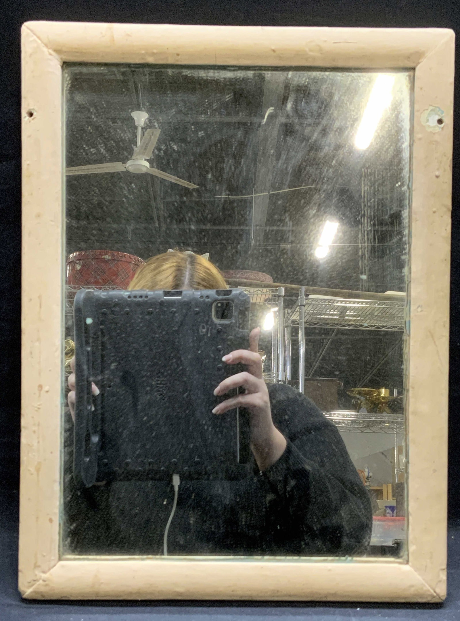 Vintage Pink Wood Wall Mirror: Vintage pale pink painted wood frame wall mirror. Measures approx. 15.5 x 11.5 inches. Scratching, chipping, and cracking observed. Piece has weight. Mirror, vintage mirror, wood mirror, wall mirror, 