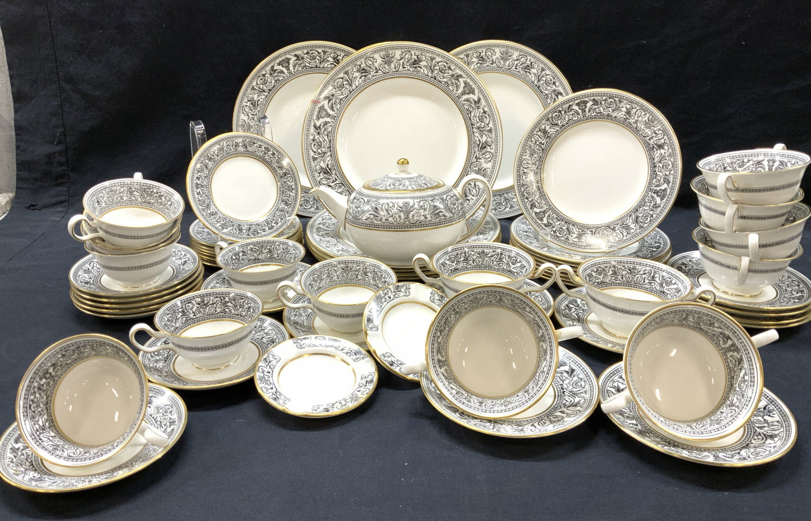 Wedgwood Florentine Chinaware Set 60, England: WEDGWOOD Florentine # W4312 Bone China Dinner Set , brilliant white porcelain with black griffin and acanthus scroll and leaf pattern, gilt rims., All hallmarked on underside. Serves 8 people.8 Dinner