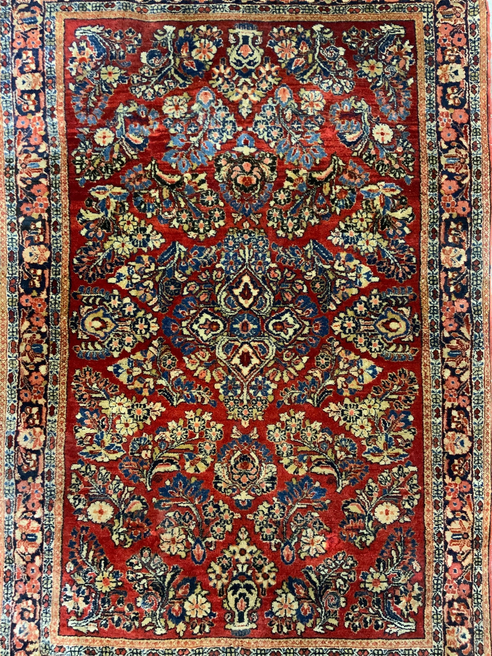 Vintage Handmade Oriental Fringed Wool Rug: Rug is handmade & wool. Piece has intricate multi toned floral motif detail. Edges have tan toned fringes. Rug measures approximately 64 inches long 39 inches wide. Rug, carpet, handmade rug, fringed 