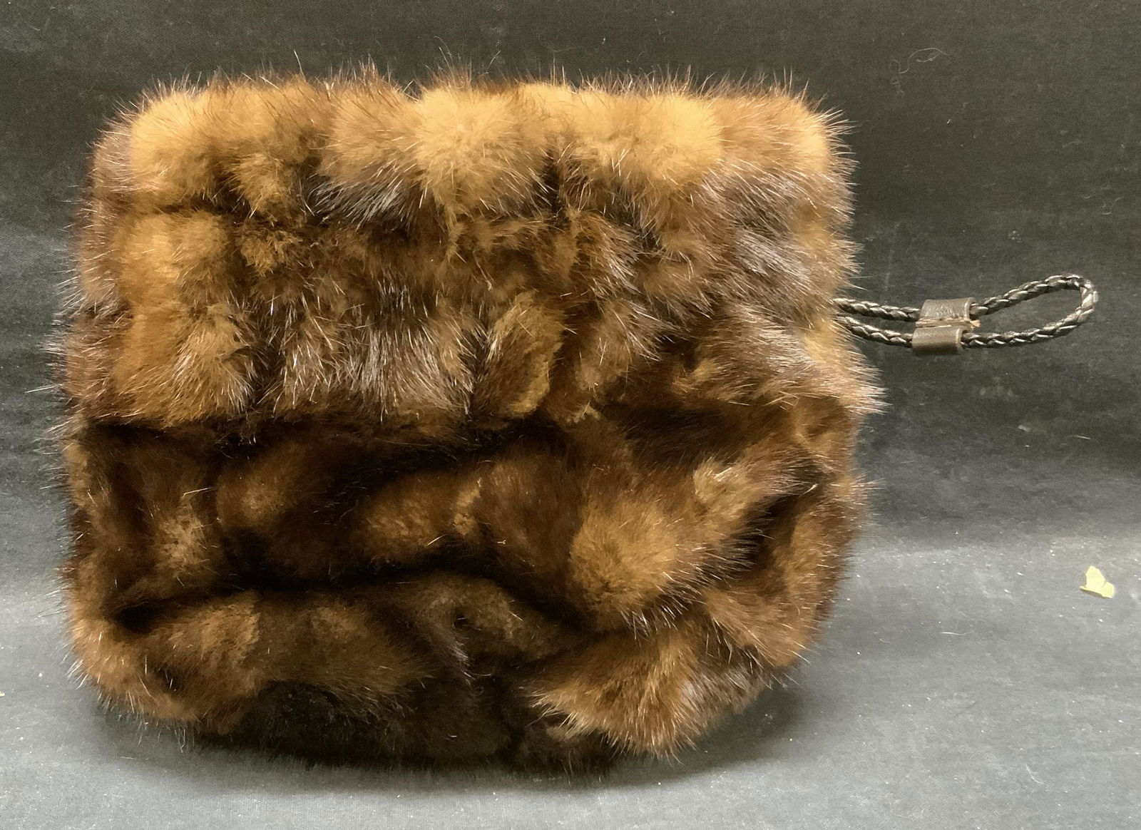 Falorni Brown Mink Fur Handbag, Italy: Falorni brown mink fur handbag. Drawstring closure. Designer label to interior leather patch. Made in Italy. Measures approx. 7 x 8.5 inches. Gently worn. Includes dust bag, some tearing to dust bag.