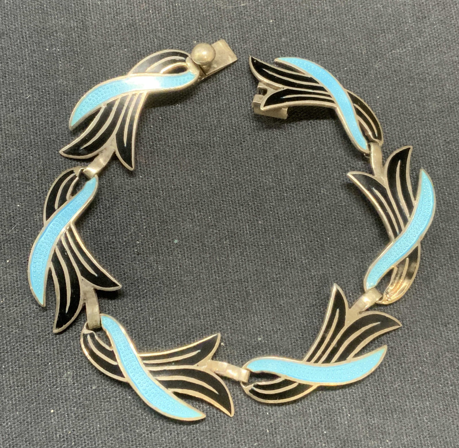 Signed Sterling Silver Enameled Bracelet, Mexico: Signed sterling silver enameled bracelet. Blue and black enamel. Signed to underside illegibly. Made in Mexico. Tests for sterling using PuriTEST kit. Measures approx. 7 inches long. Total weight .63 