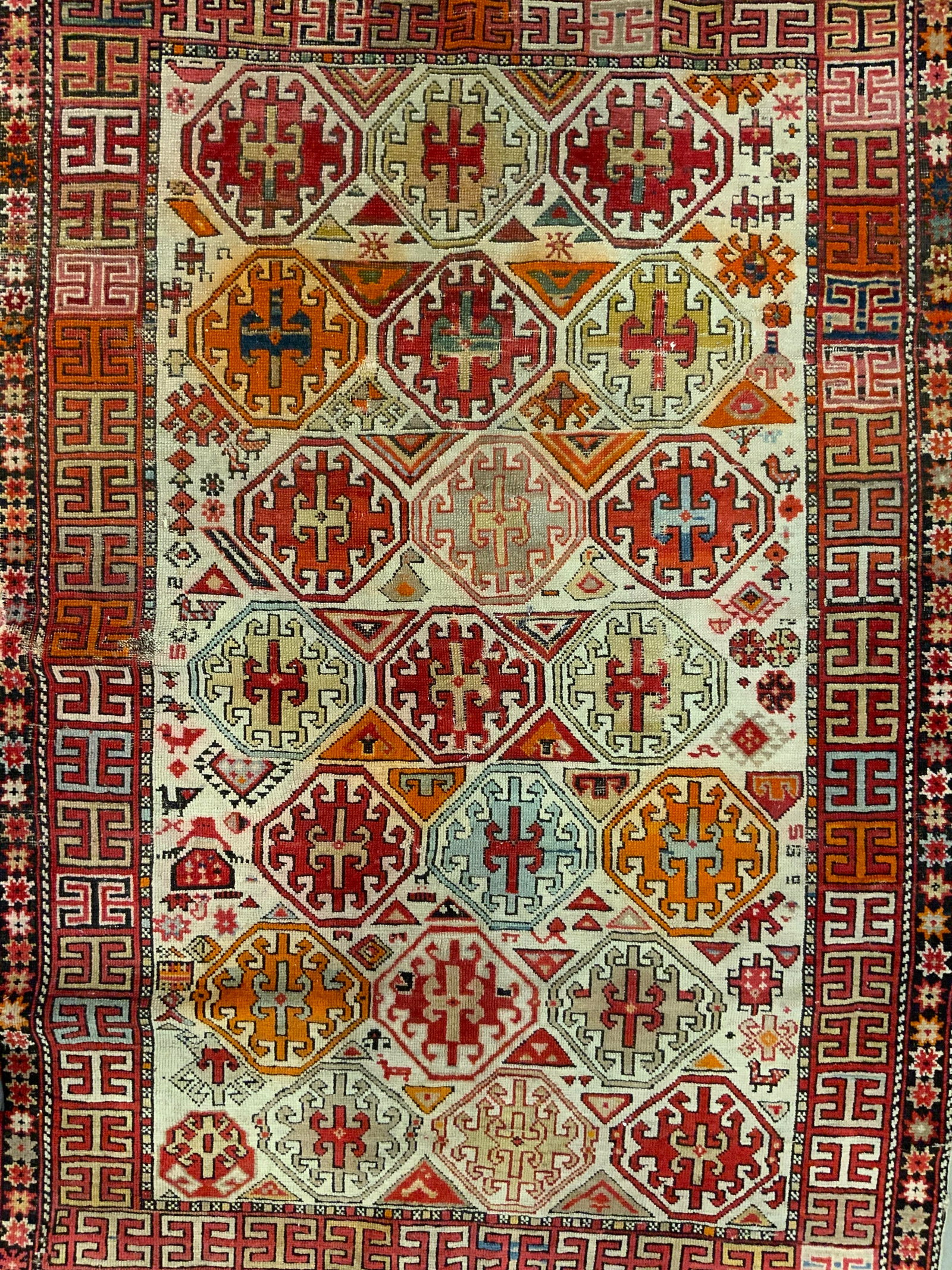 Vintage Turkish Handmade Wool Rug: Rug is handmade and wool. Piece is vintage, appear to be Turkish. Rug has intricate multi toned geometric detail. Short fringes at edges. Rug measures approximately. 61 inches long 43 inches wide. Rug
