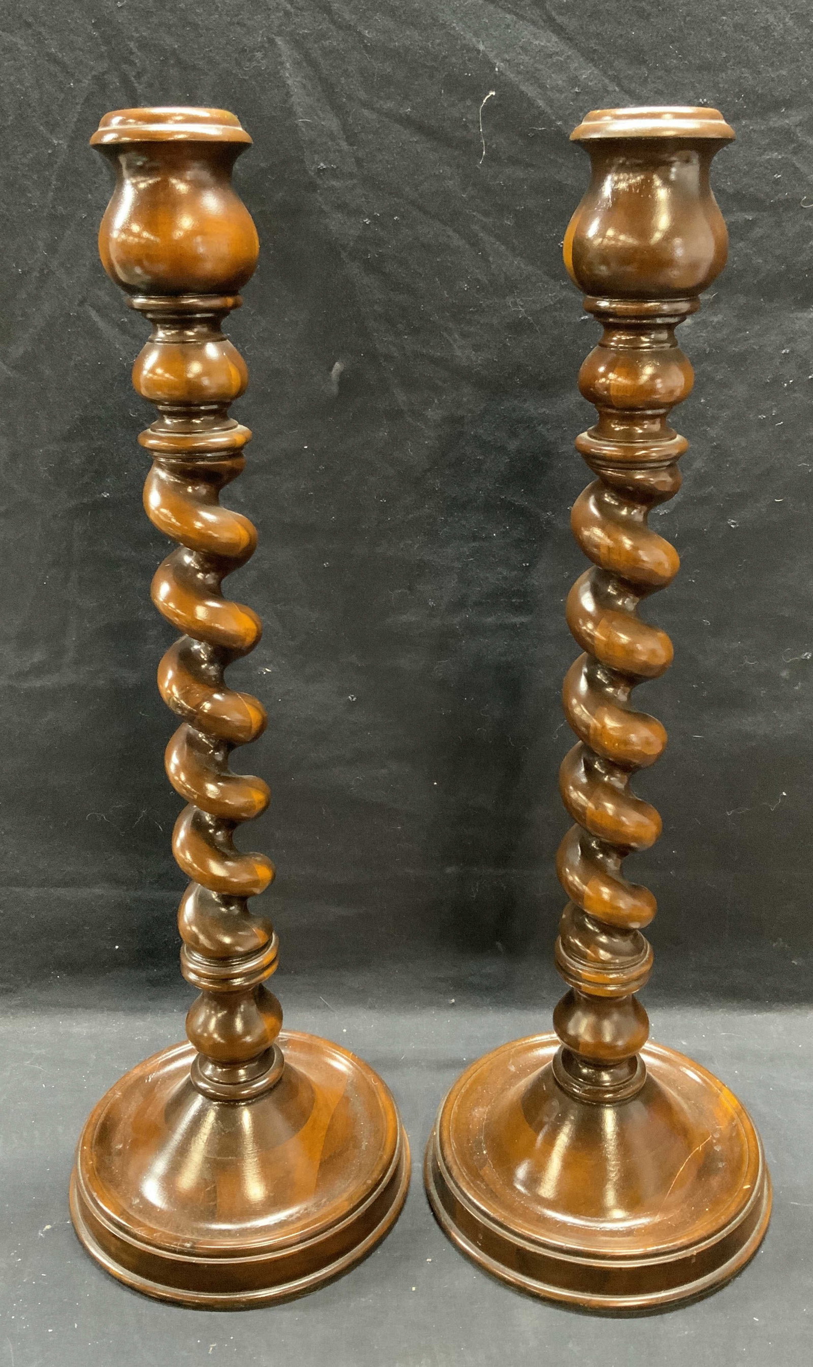 Pair Turned Wood Spiral Candle Sticks, 2ft1in: Pair of turned wood spiral column candle sticks. Handmade. Sizes vary slightly, taller piece approx. 8 x 25.5 inches. Both pieces have some surface wear including scratching observed. Turned wood cand