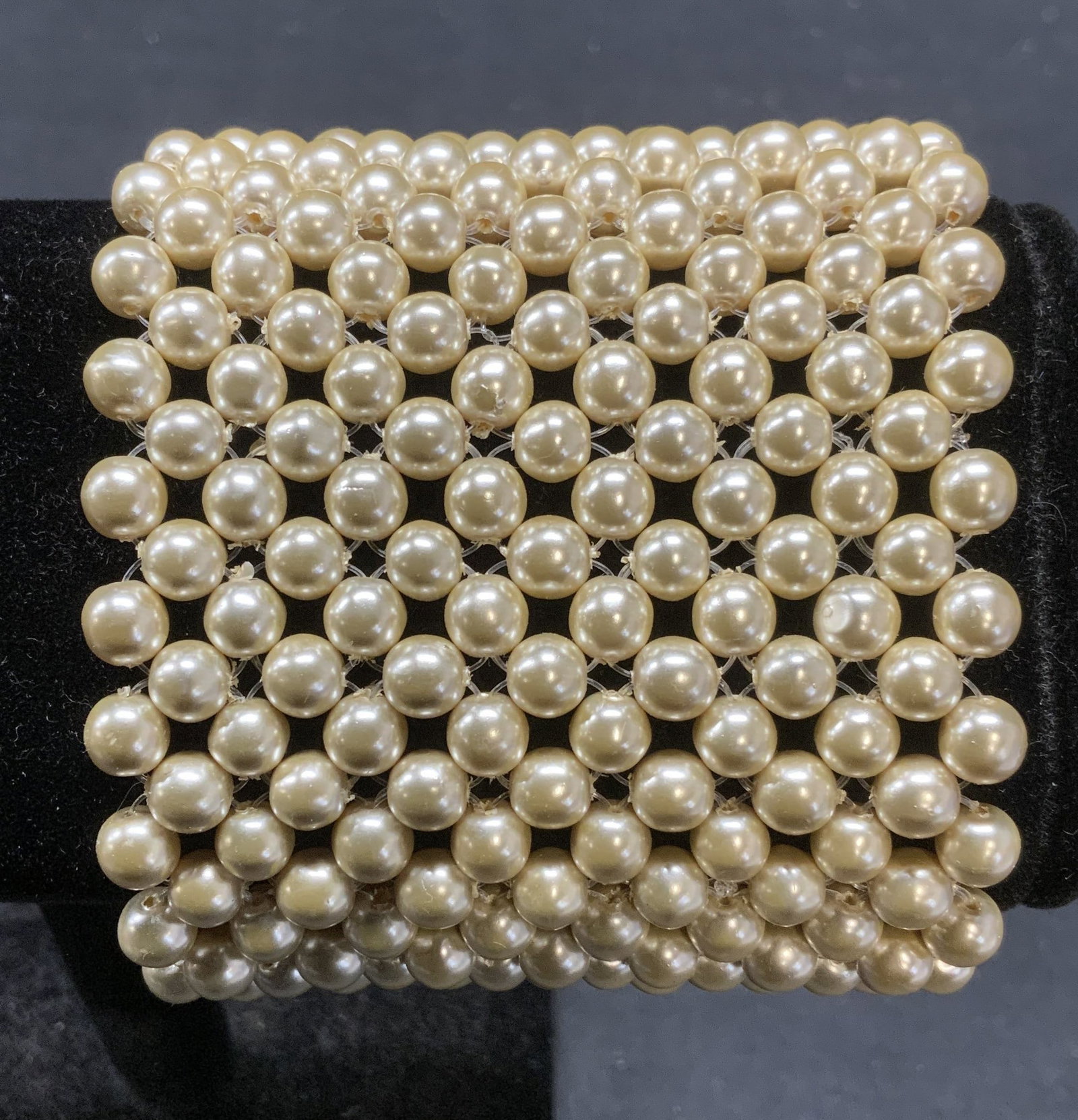 Faux Pearl Beaded Chunky Bracelet: Faux pearl beaded chunky cuff bracelet. Measure approx. 7.25 inches long, cuff approx. 2.5 inches wide. Some scratching observed. Estate jewelry, costume jewelry, cocktail jewelry, fashion jewelry, ac