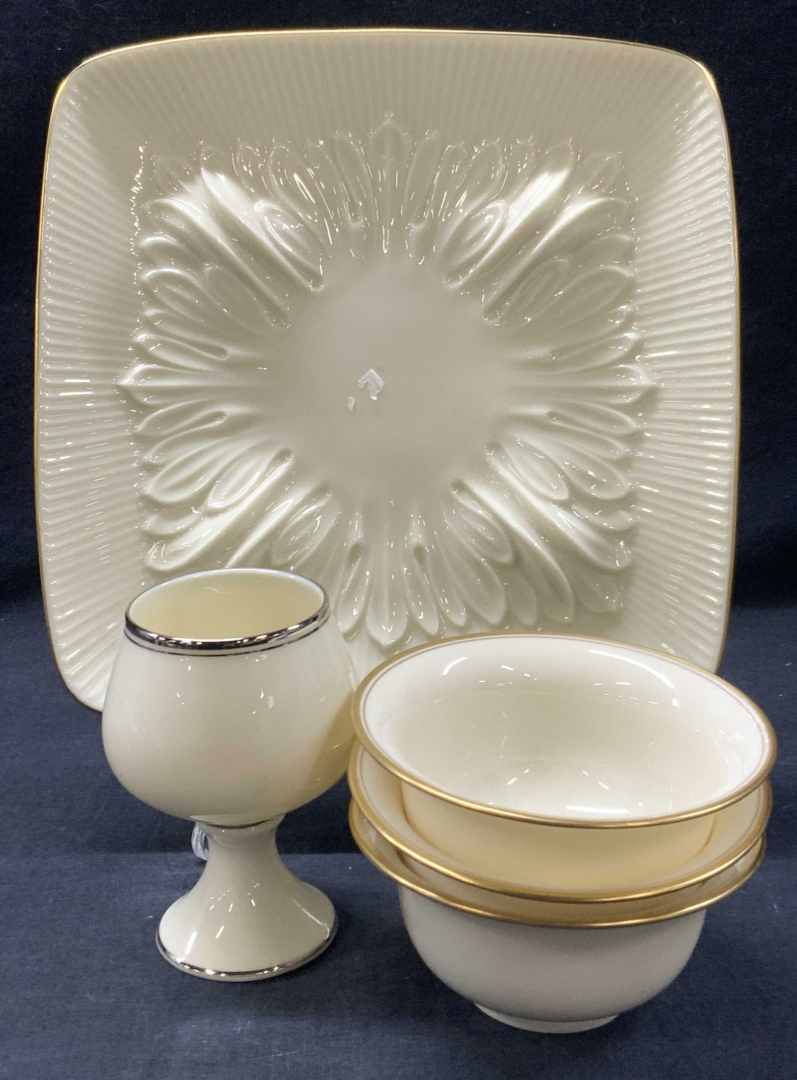 Lot 5 Lenox Porcelain Kitchen Accessories: Lot of 5 Lenox Porcelainware. 1 dish, approx 8 inch diameter, 1 goblet with silver gilt on rims. Approx 4 inches tall and 3 bowls at 2 inches tall and 4 in diameter, these with gilt rims. Moderate wea