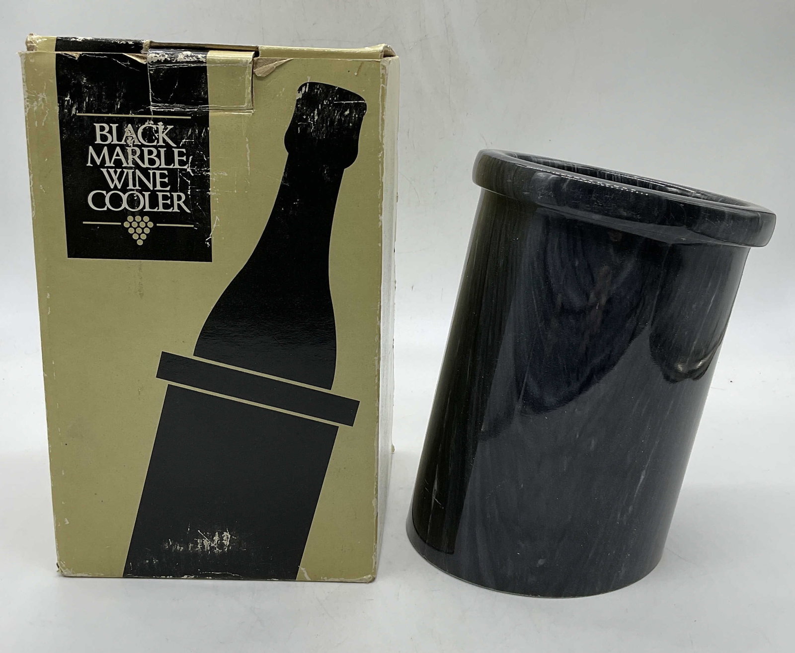 Black Marble Wine Cooler In Box: Black Marble Wine Cooler In Box. The Pantene Company. Measures approx. 7H x 5W in. Some surface wear consistent with age, and use. Property of Manhattan estates and fashion industry executive. Barware