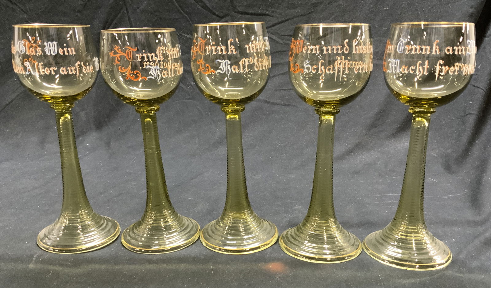 Set 5 Hand Blown Crystal Goblets, Germany: Hand painted chartreuse crystal goblets. Lettering is in German each with a different expression. Hand blown crystals with a ribbed stem and gilt rim., 7 in. Tall. Goblet measures 2.5 in, wide. Some r