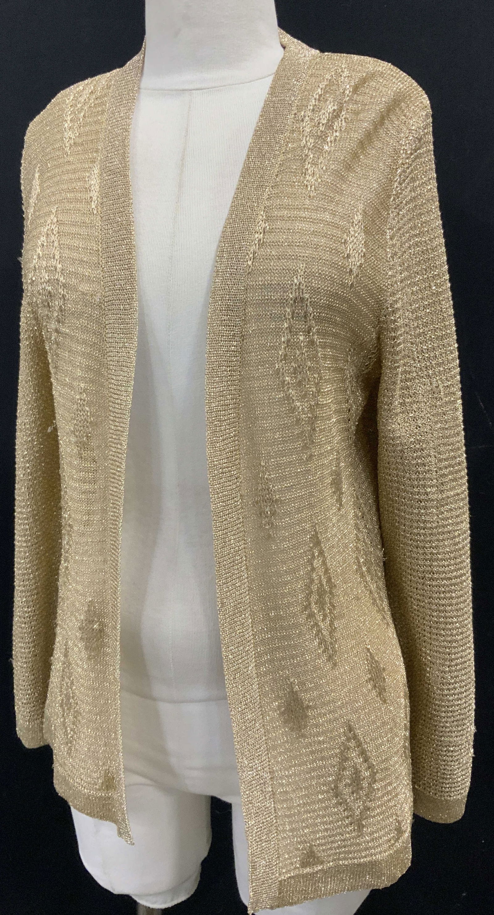 BERGDORF GOODMAN Coronia Gold Knit Cardigan: Vintage metallic and polyester gold knit cardigan, sold at BERGDORF GOODMAN on the Plaza Luxury department store. Designer Coronia. Size large. A few thread pulls consistent with wear and exposure and