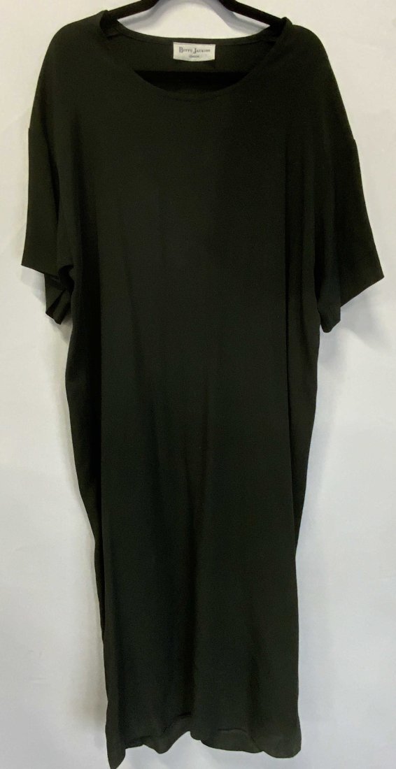 BETTY JACKSON LONDON Silk Blend Black Dress England: A vintage long length black silk blend dress. Short sleeves. Slight split to the sides. Tags read BETTY JACKSON LONDON, M, 70% ACETATE, 30% SILK, MADE IN ENGLAND. Length measures approx. 52 inches in 
