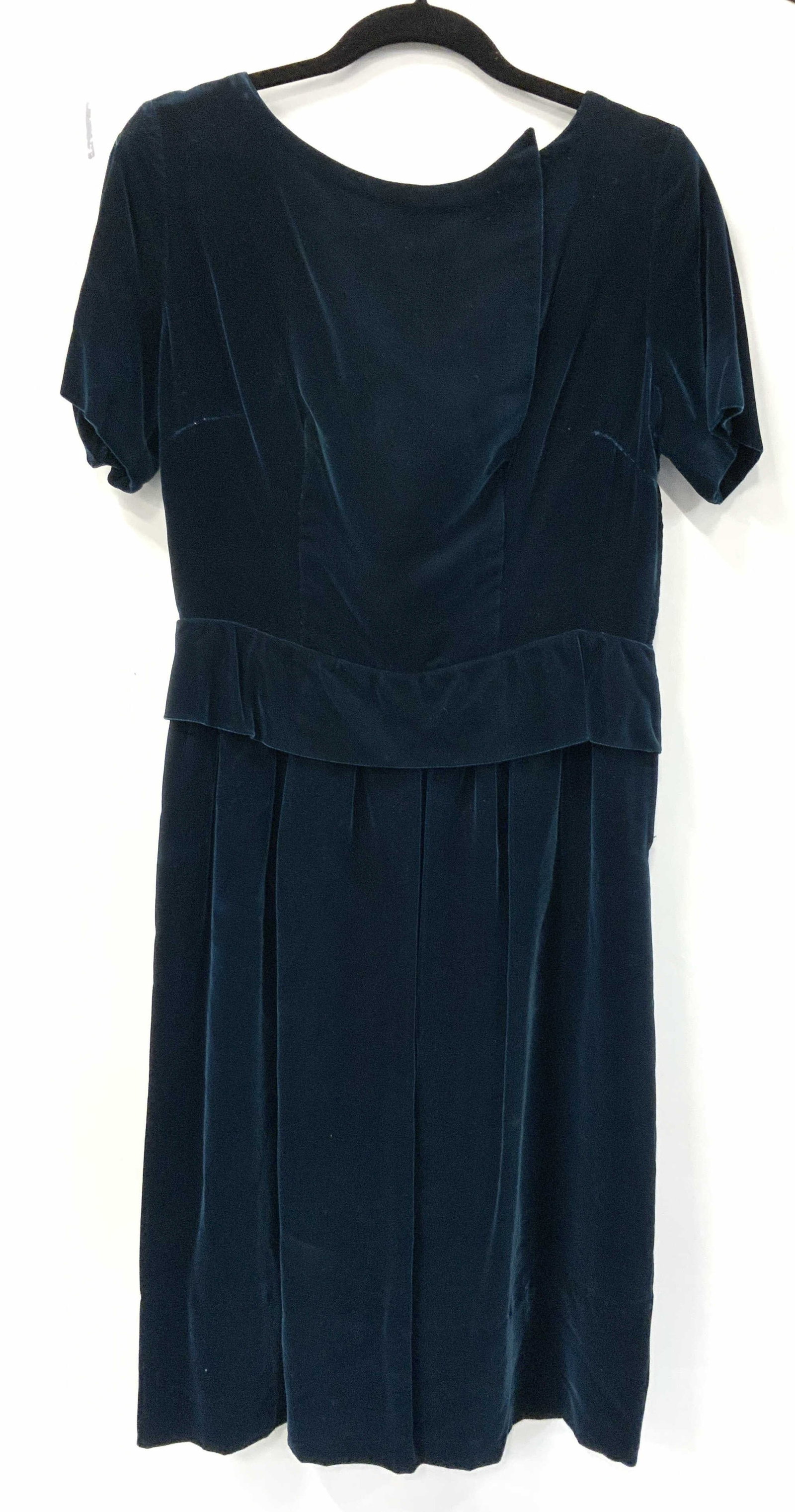 Handmade Dark Teal Velour Cocktail Dress: Short sleeve handmade teal velour dress, lightly pleated waist with an over flap design. Side zipper and backside matching velour buttons. Fully lined. 43 in. Long, waist 28-30 in. Chest 17 in. Across