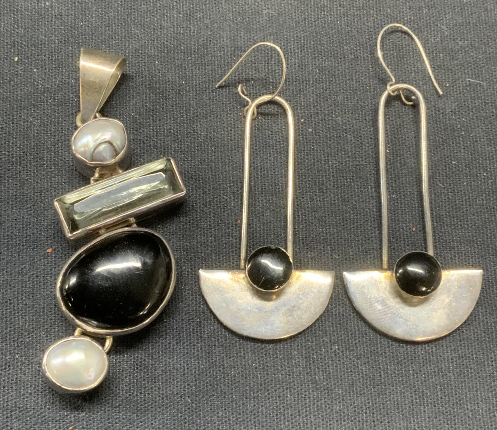 Lot 2 Sterling Silver Pearl Pendant, More: Lot of 2 jewelry pieces. Sterling silver, pearl, and glass stone pendant. Tests for sterling using PuriTEST kit. Measures approx. 2.25 x 1 inches. Total weight 21.2 grams. Silver tone sculptural dangl