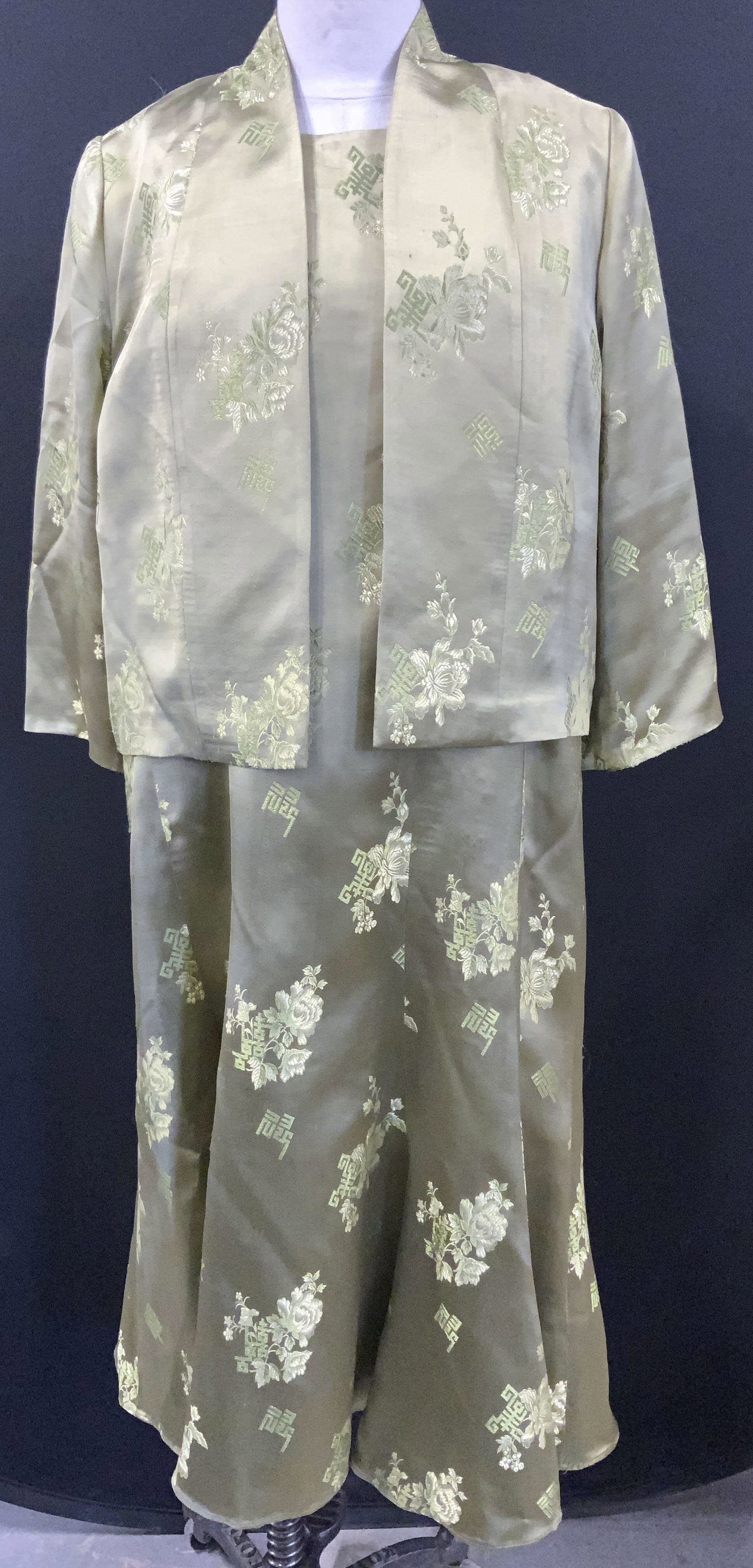 Asian Greek Key Print Satin Dress w Jacket, 2: Green Greek key and Famille rose Asian dress with marching jacket. Wear as an ensemble or as separates. Dress is straight with a lower hem subtle ruffle that flares. 40 in. Waist, 43.5 in. Long. Open 