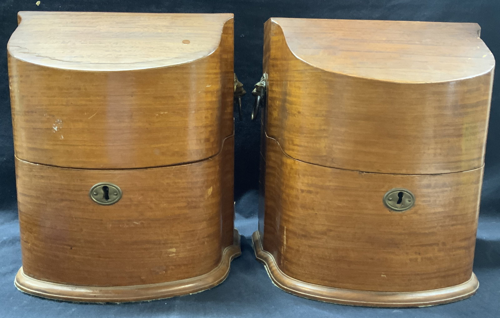 Pr Vintage Wooden Knife Cases Lion Head Handles: Pair of vintage wooden made knife cases with hinged lids and lion head side handles. Approx 12 inches tall and 9.75 inches wide, bases are approximately 10.25 x 8 inches Moderate wearing to wooden ext