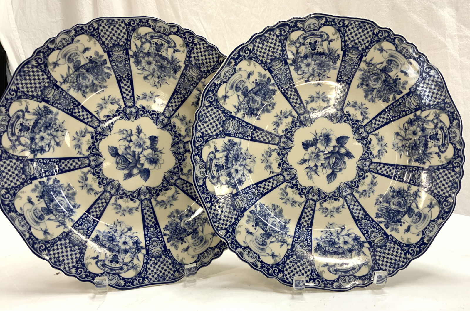 Pair Hand Painted Floral Stoneware Plates: Hallmarked English Stoneware Dinner Plates, hand painted with blue florals in tea cups with scrolling., approx 12.5 in. Diameter., heavy plates. English Stoneware Dinner plates, Hand painted Plates, t