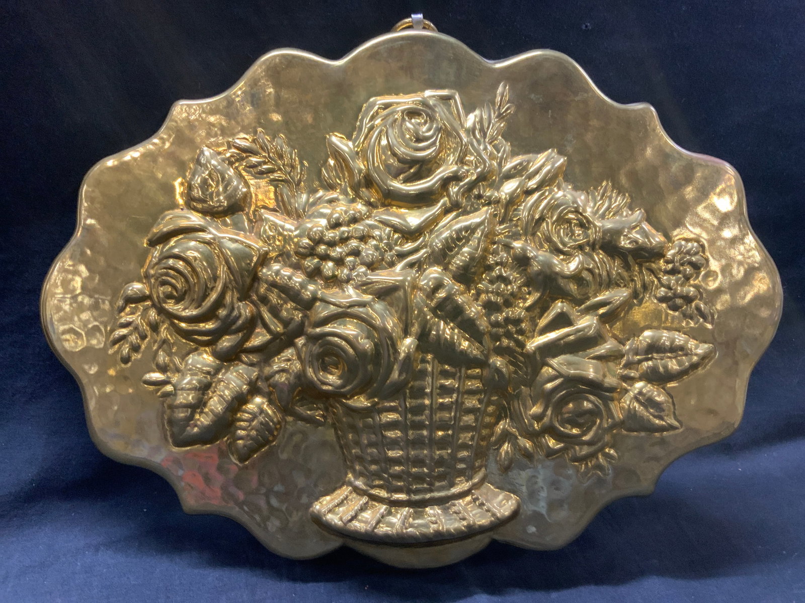 Birth Gram Cast Embossed Metal Decor, Switzerland: Marked Birth Gram, made in Switzerland. Cast Metal and embossed with floral design of a flower bouquet in a wicker basket. Approx 11.5 x 15 inches Moderate wearing to metal on edges and underside. Cas