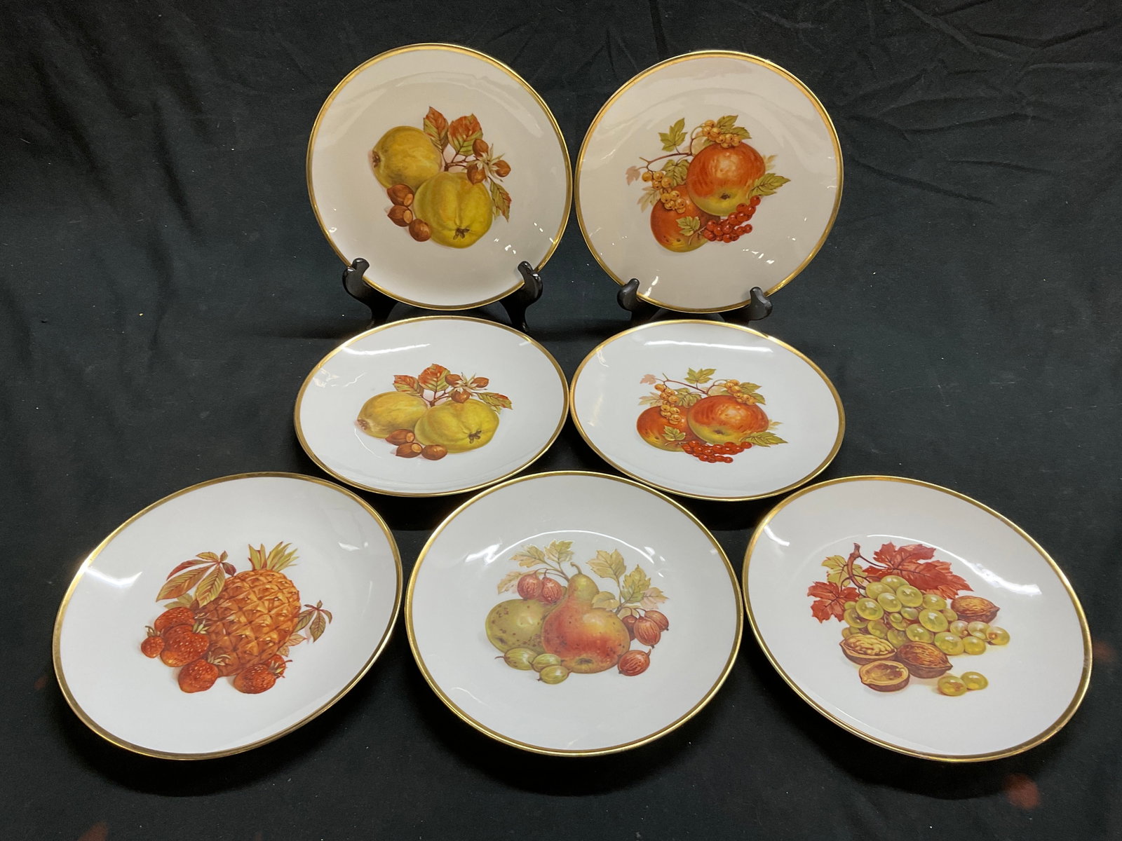 Set 7 Bareuther Porcelain Luncheon Plates, Germany: Set 7 Bareuther Porcelain Luncheon Plates with gold toned trim. Made in Germany. Measure approx. 8in diameter. Some surface wear consistent with age, and use. Bareuther Waldsassen tabletop decor, deco